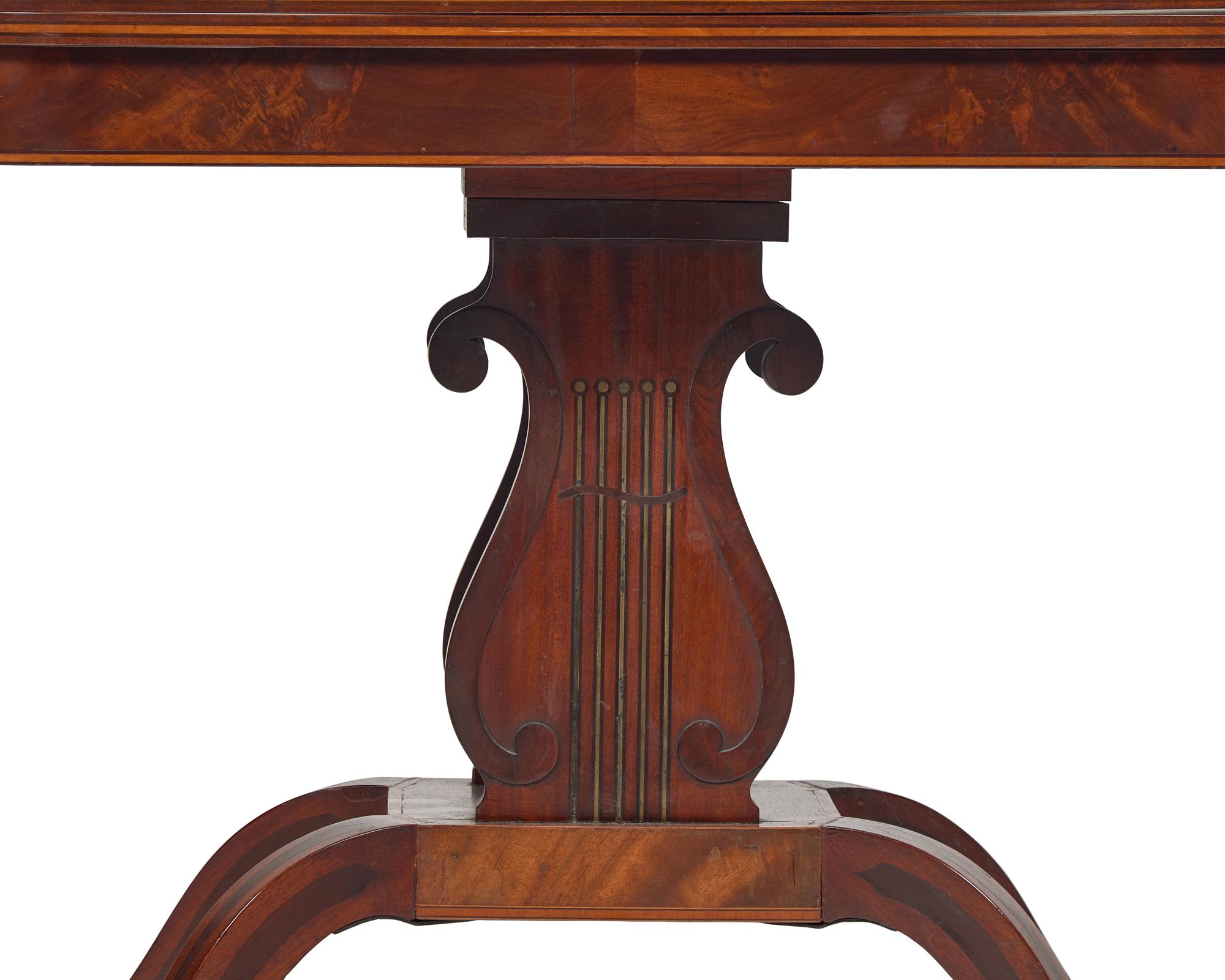 A Late Federal or Classical Inlaid Mahogany Card Table