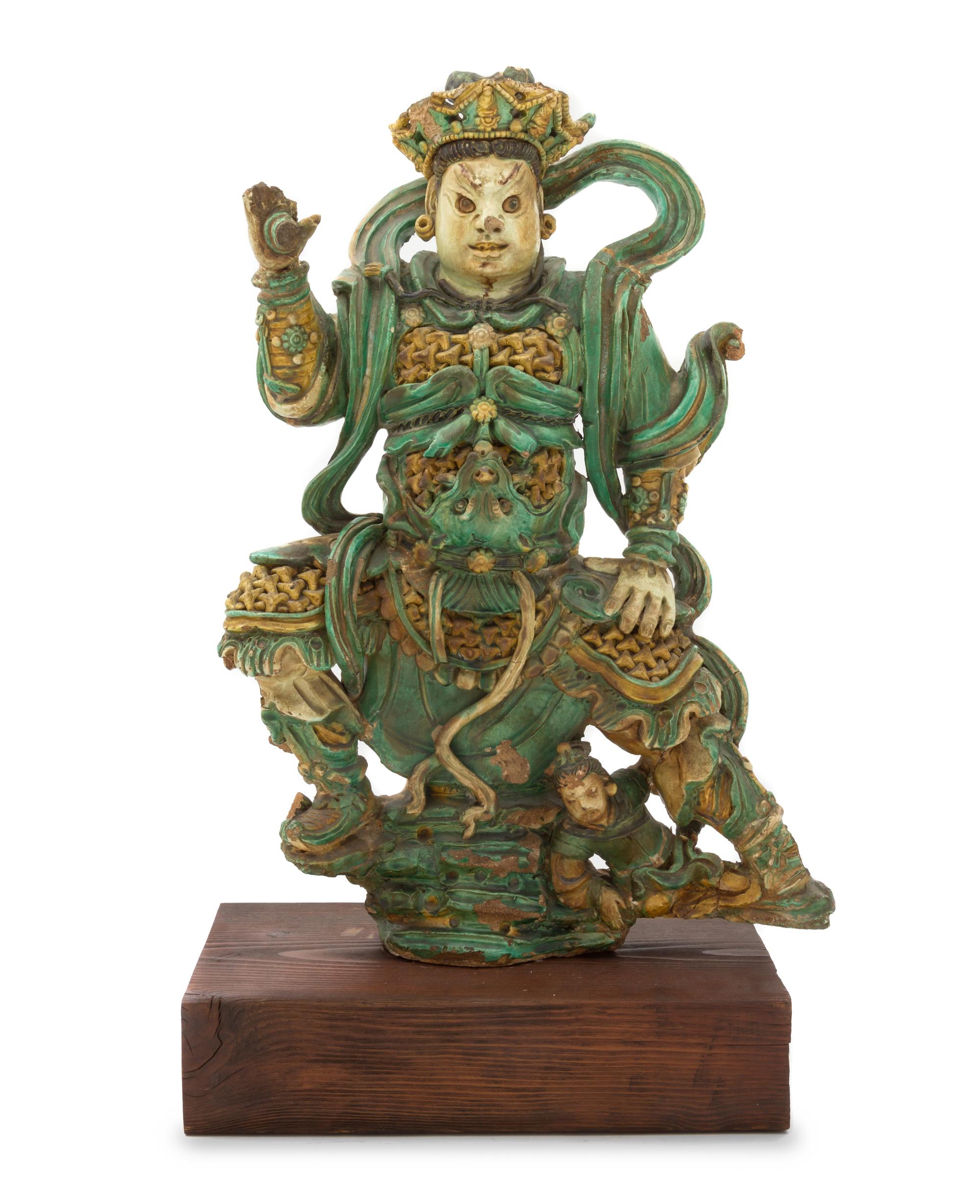 A Large Chinese Sancai Glazed Pottery Figure of a Guardian MING DYNASTY Height of figure 23 inches. — MING DYNASTY