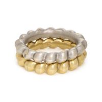 PAIR OF WHITE AND YELLOW GOLD BANGLE BRACELETS