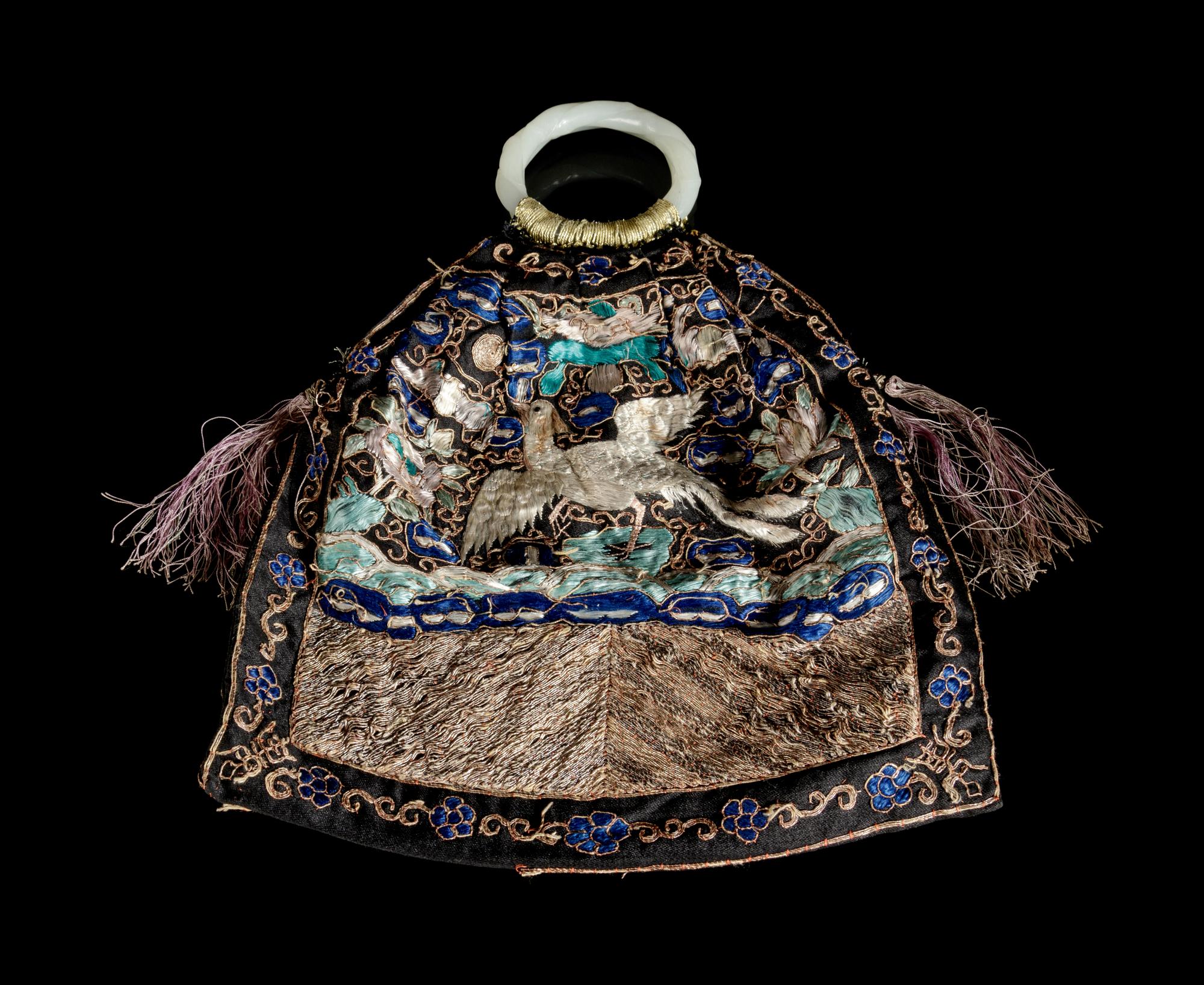 A Chinese Embroidered Silk Purse with a Pair of Jade Bangles