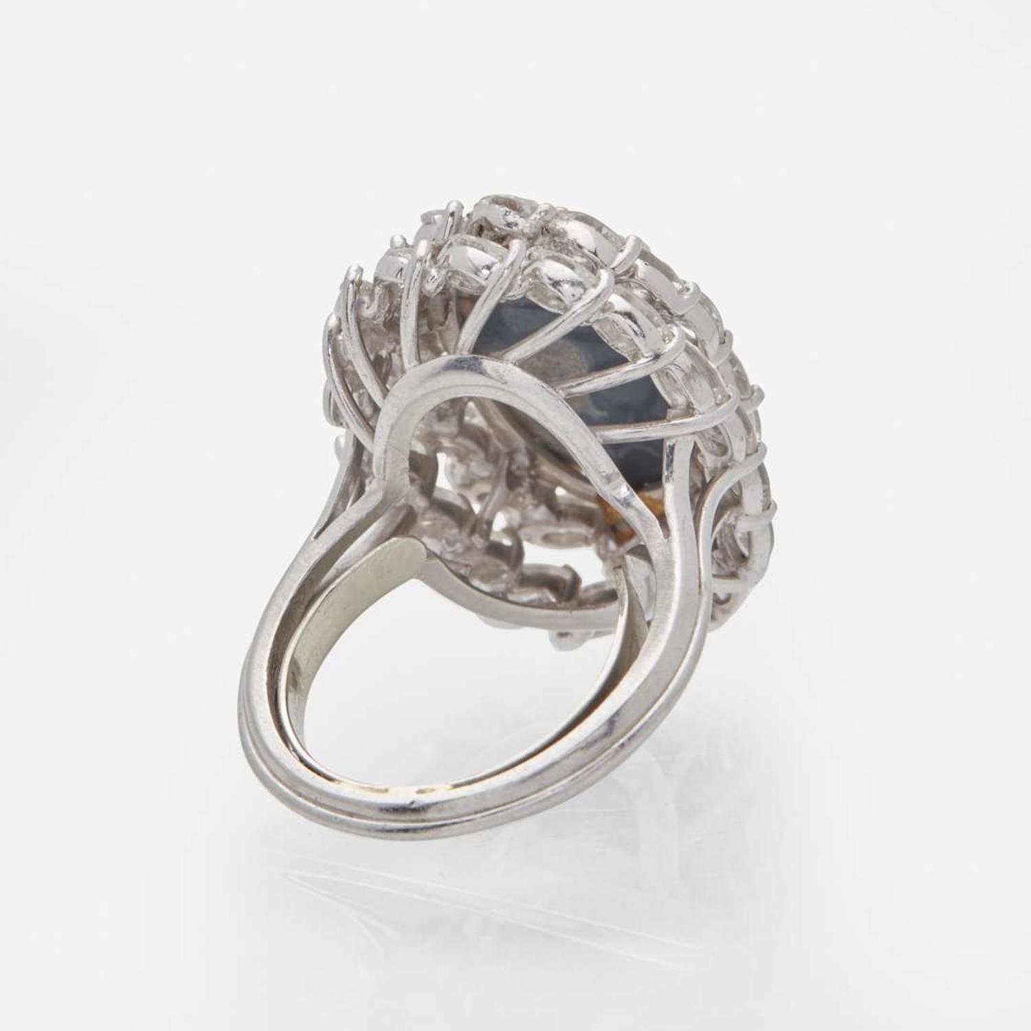 A Platinum, Black Opal, and Diamond Ring