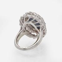 A Platinum, Black Opal, and Diamond Ring