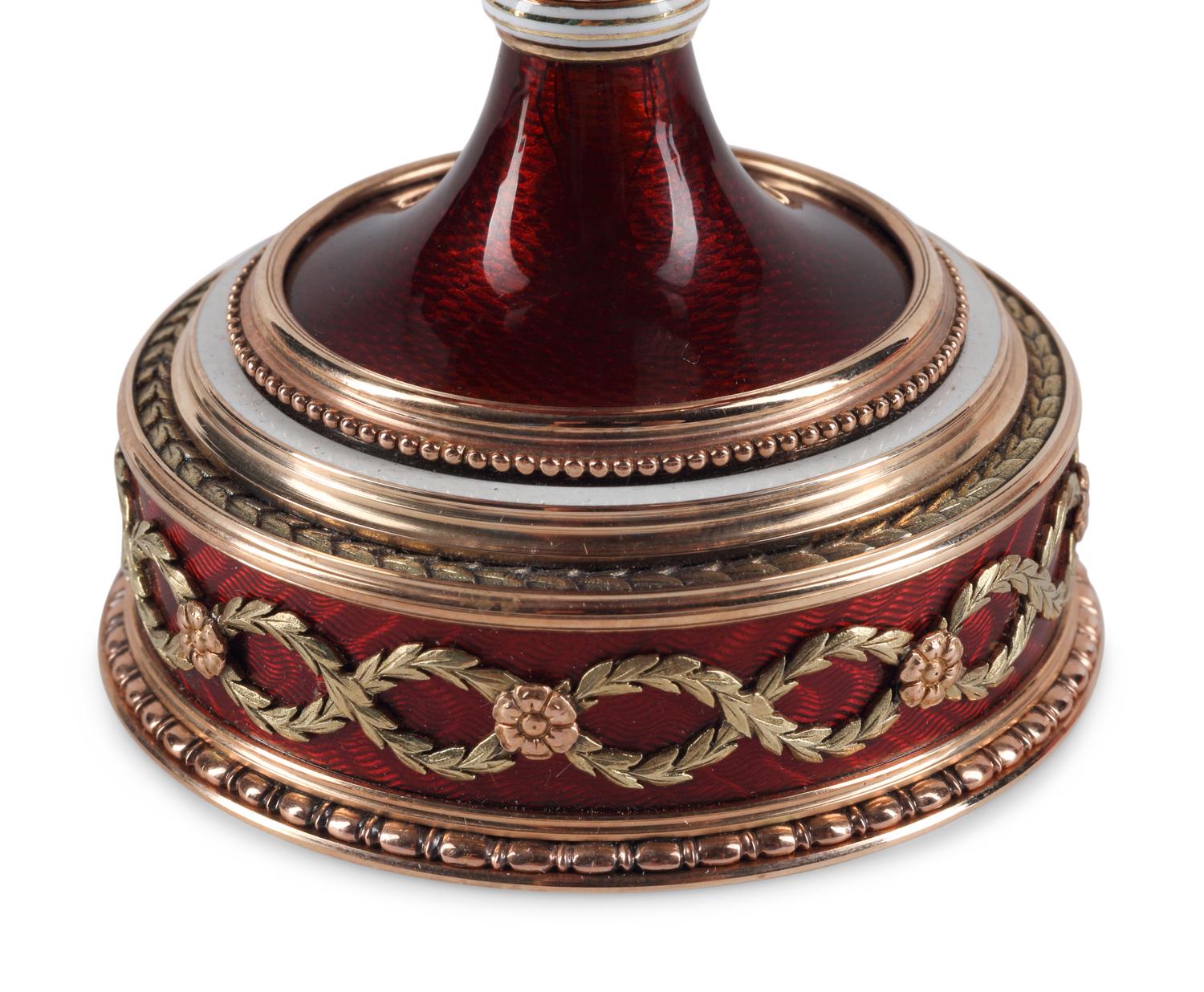 A 14-Karat Gold, Diamond, Gemstone and Guilloché Enamel Surprise Egg