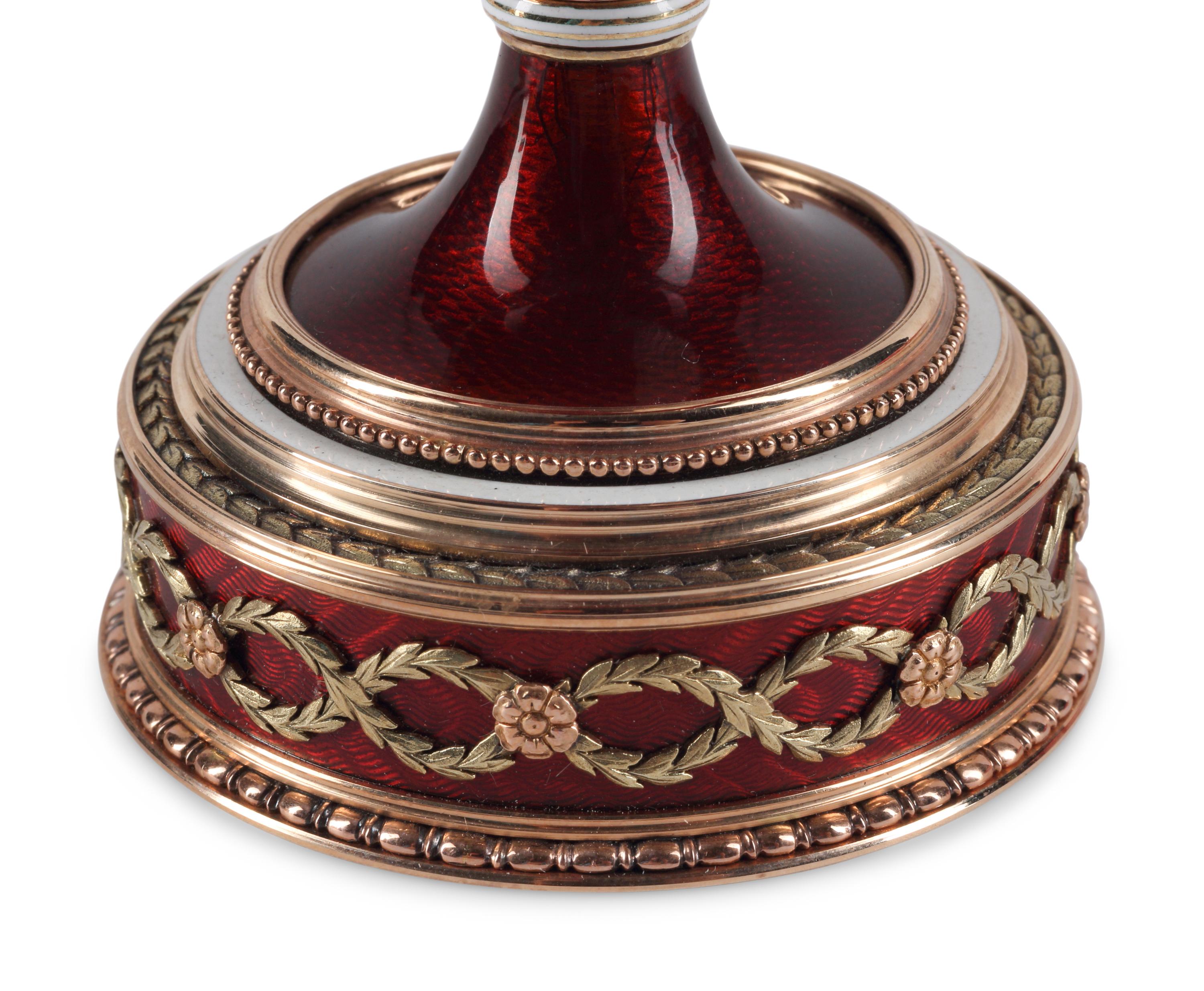 A 14-Karat Gold, Diamond, Gemstone and Guilloché Enamel Surprise Egg