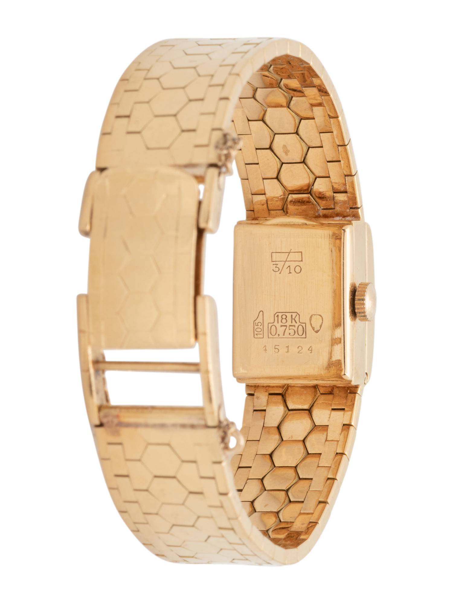 BUCHERER, 18K YELLOW GOLD AND DIAMOND SURPRISE WRISTWATCH