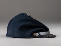 [CIVIL WAR]. Forage cap with contractor label featuring 104th regimental number and insignia.