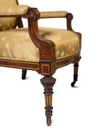 A Continental Parcel Gilt Walnut Four-Piece Seating Suite