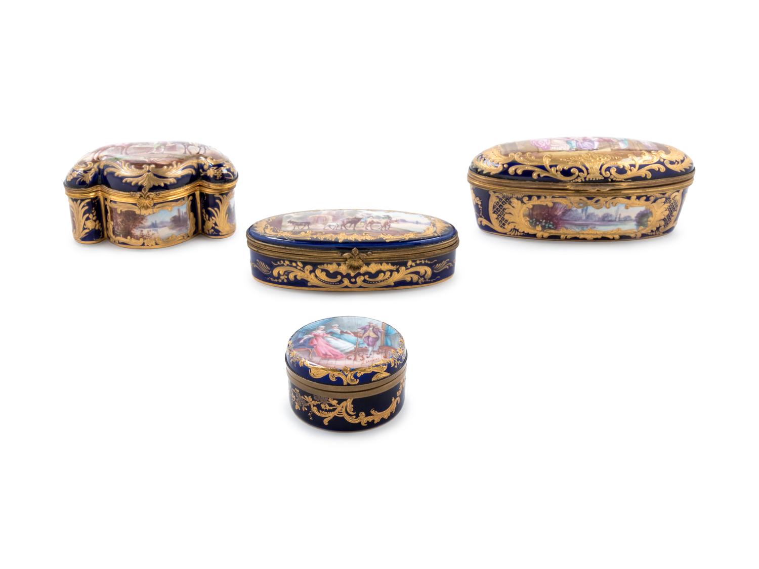Four Sèvres Style Gilt Metal Mounted Painted and Parcel Gilt Porcelain Boxes