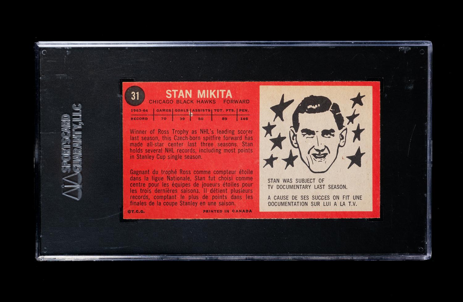 A 1964 Topps Stan Mikita Hockey Card No. 31 (SGC 88 NM-MT 8)
