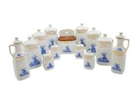 A Set of Thirteen German Porcelain Canisters