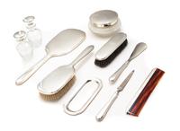 An American Silver Ten-Piece Dresser Set, Blackington & Co., North Attleboro, MA, First half 20th century, comprising a hand mirror, a
