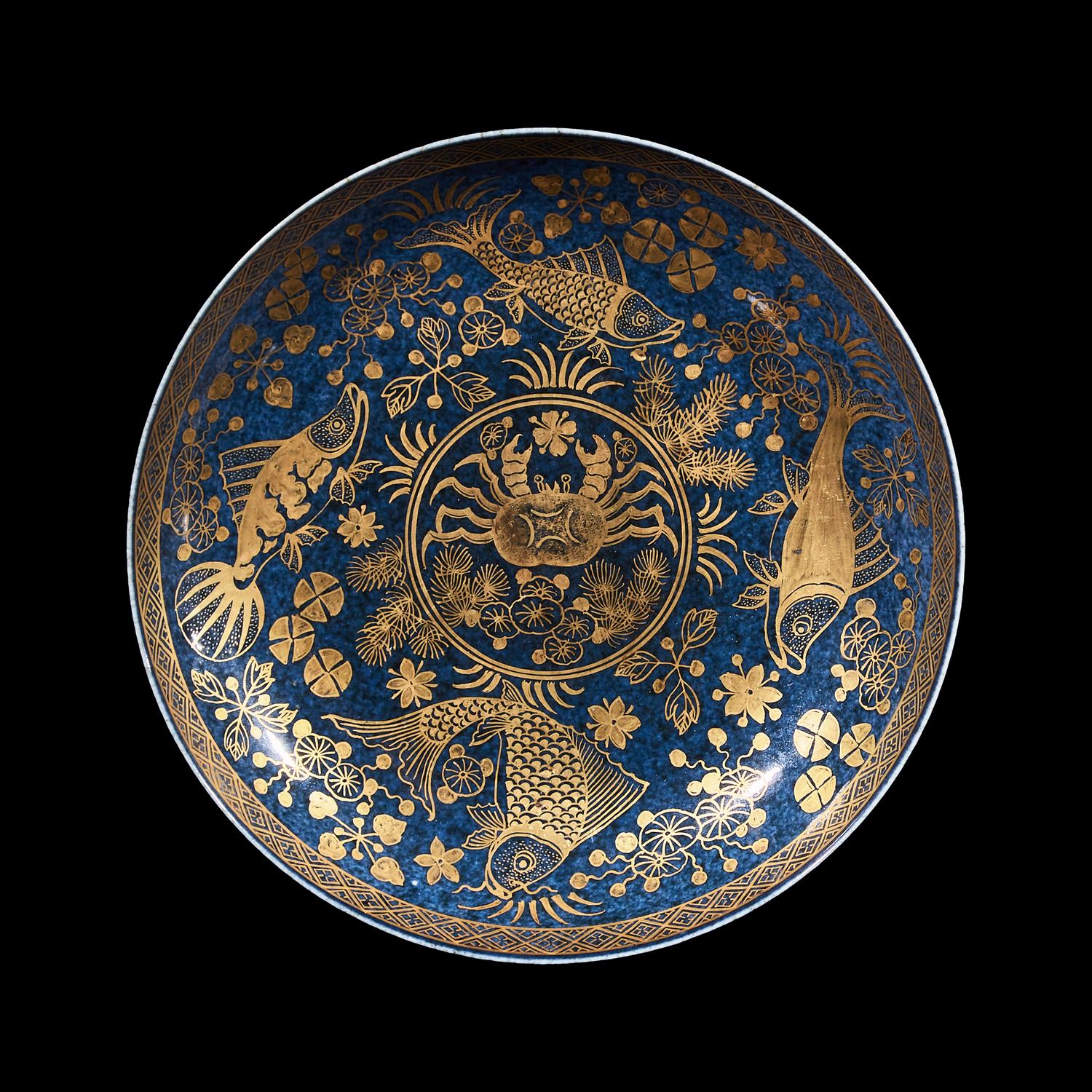 A Gilt Decorated Powder Blue Ground 'Fishes' Dish, 18th Century 清中期 藍地描金魚藻紋賞盤