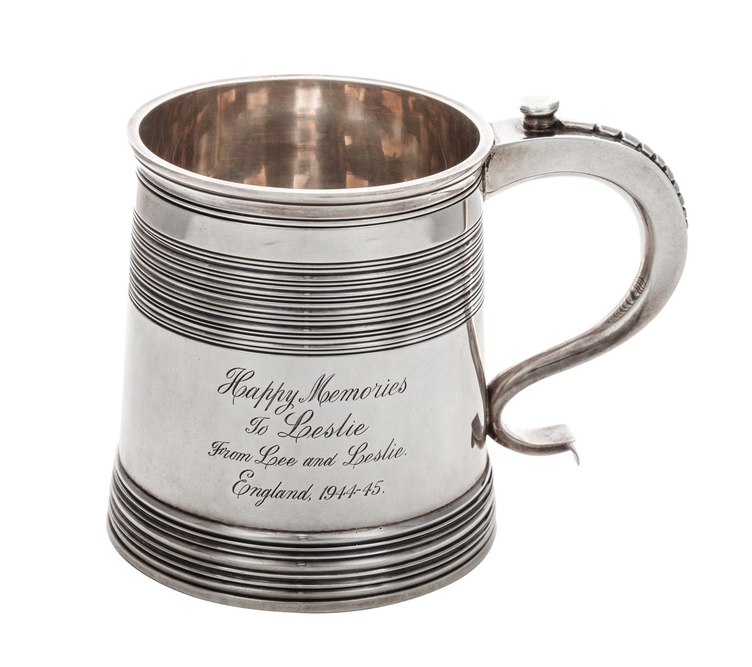 A George VI Silver Tankard, FRT & Co., London, 1938, of tapering form with ringed decoration.