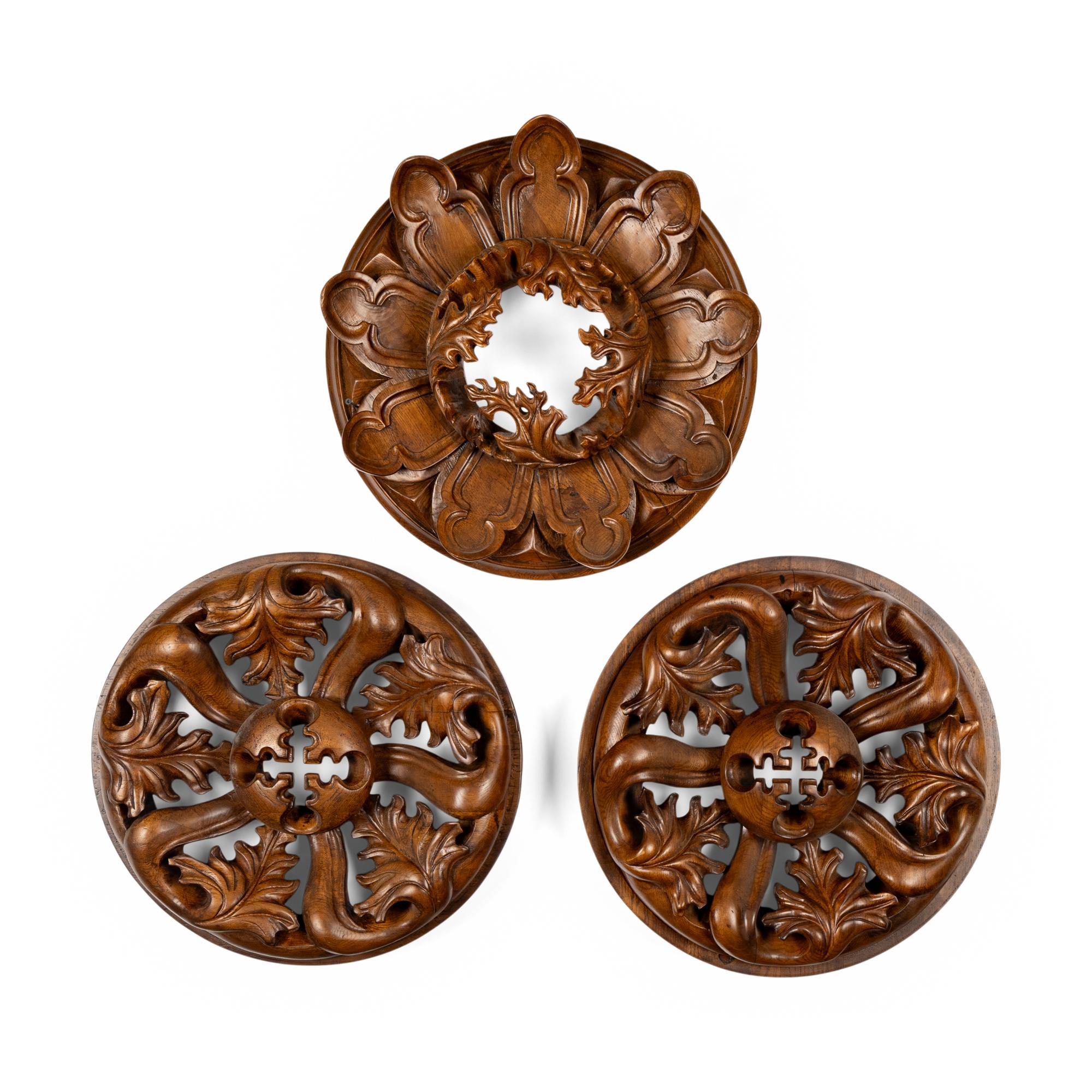 A Pair of Carved Oak Roundels