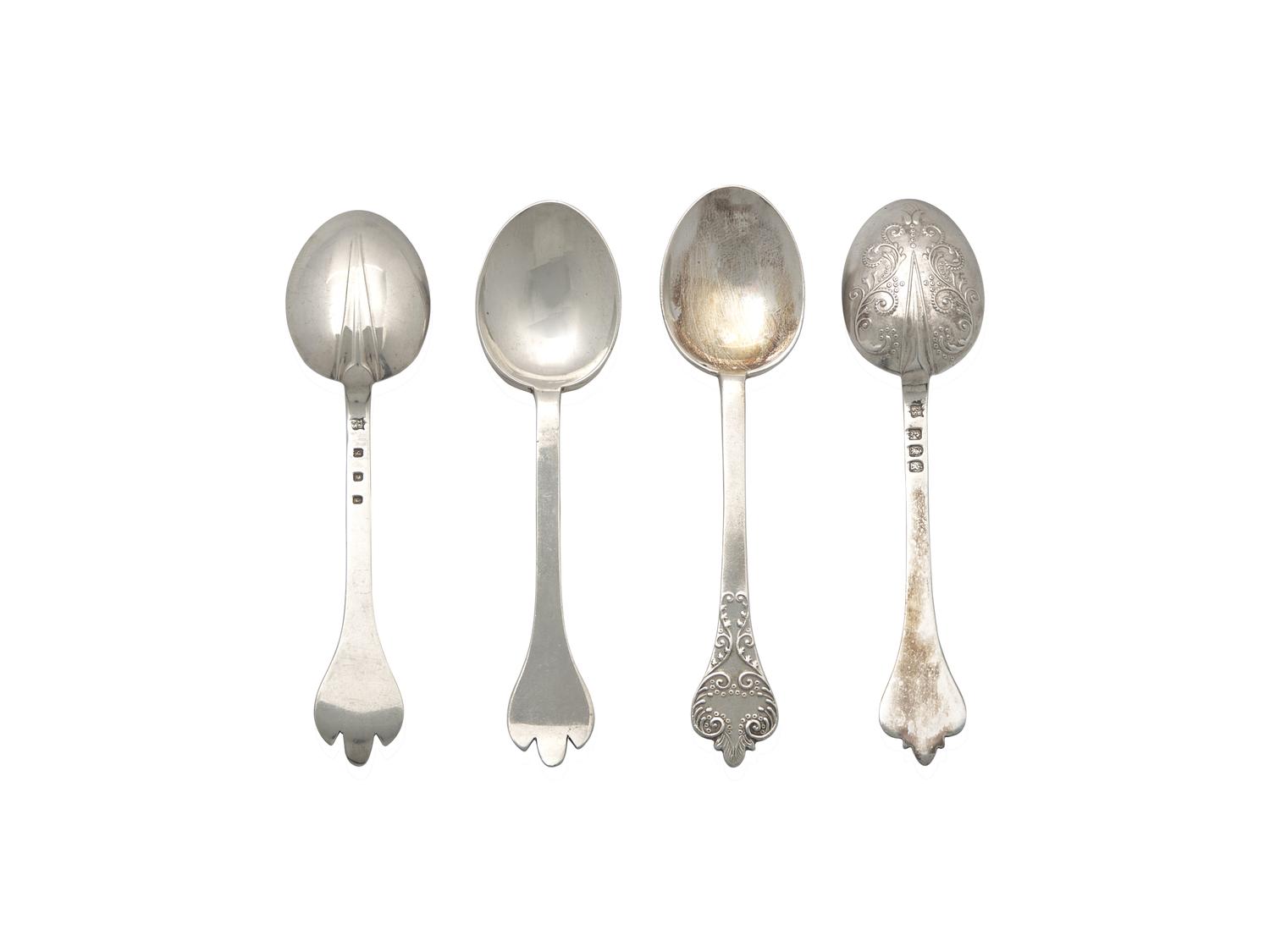 Two Cased Sets of Six George V Britannia Silver Trefid Teaspoons