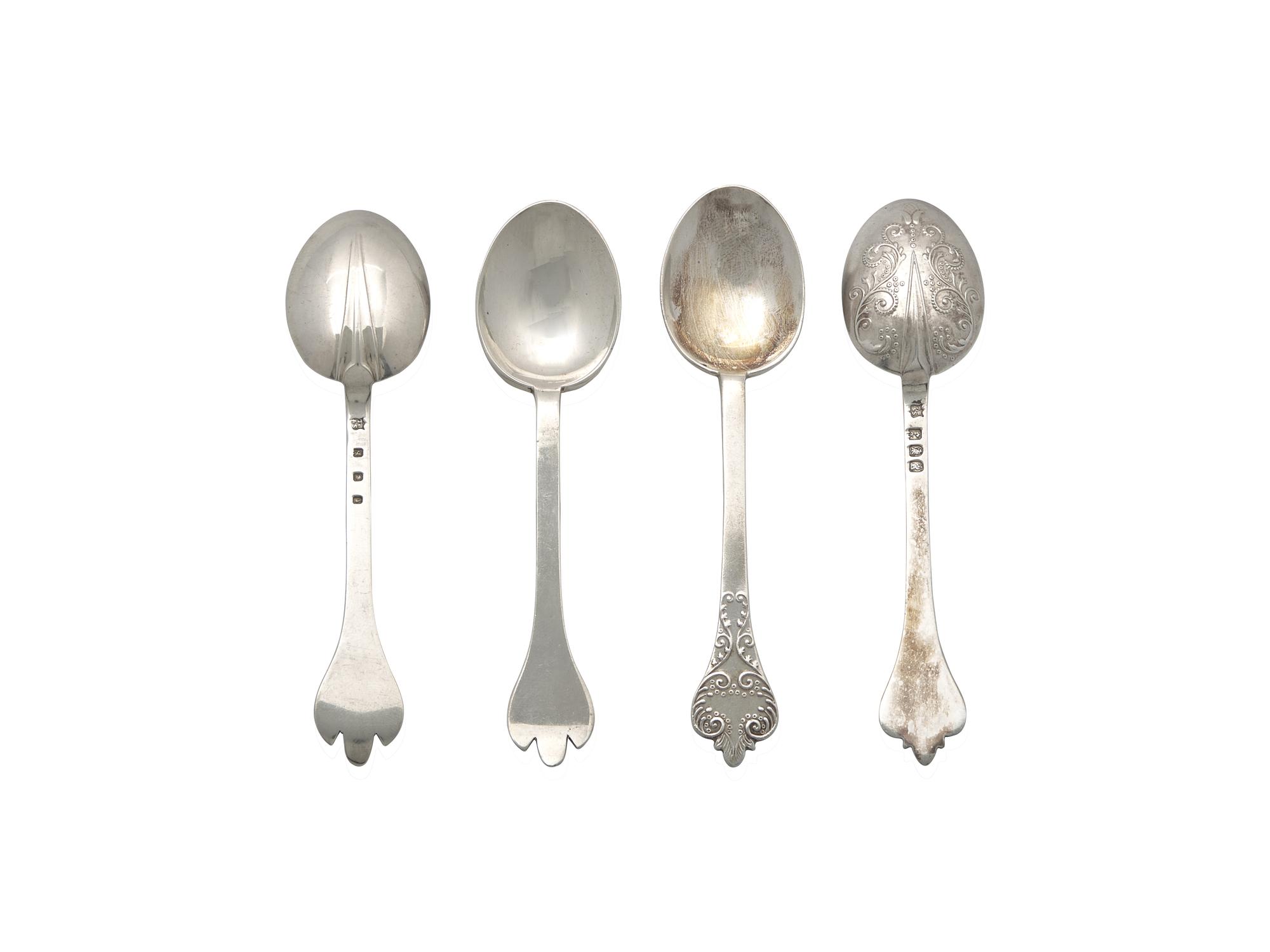 Two Cased Sets of Six George V Britannia Silver Trefid Teaspoons