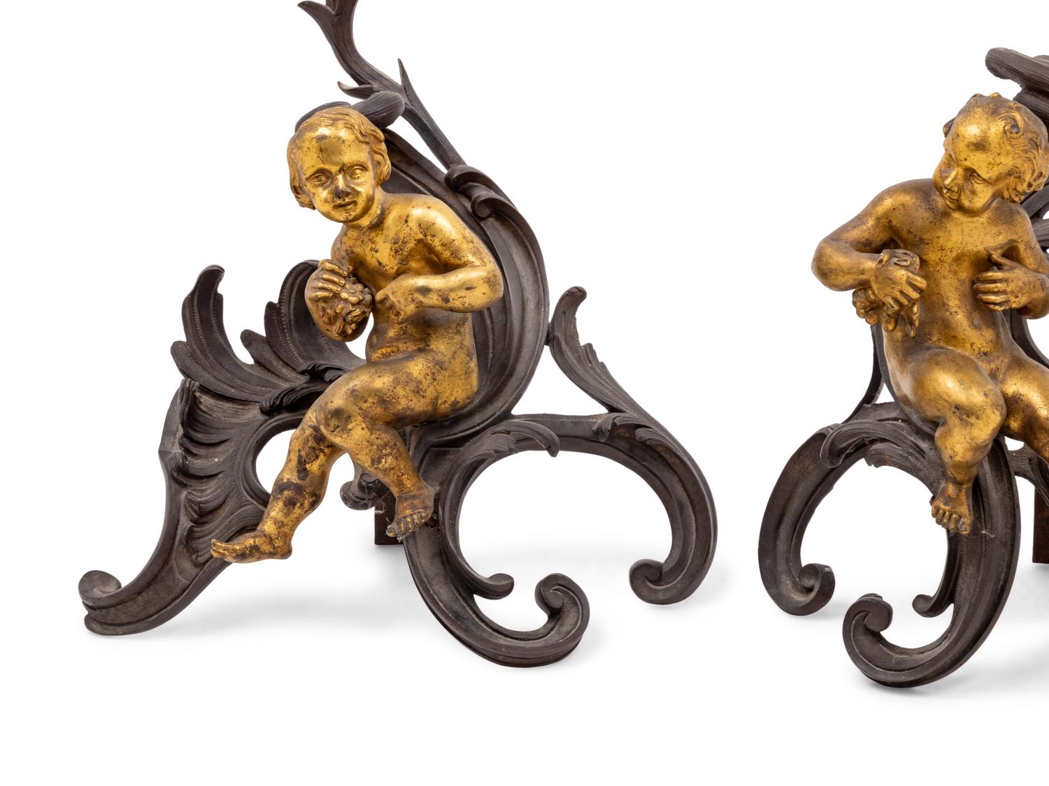 A Pair of Italian Rococo Gilt and Patinated Bronze Figural Chenets
