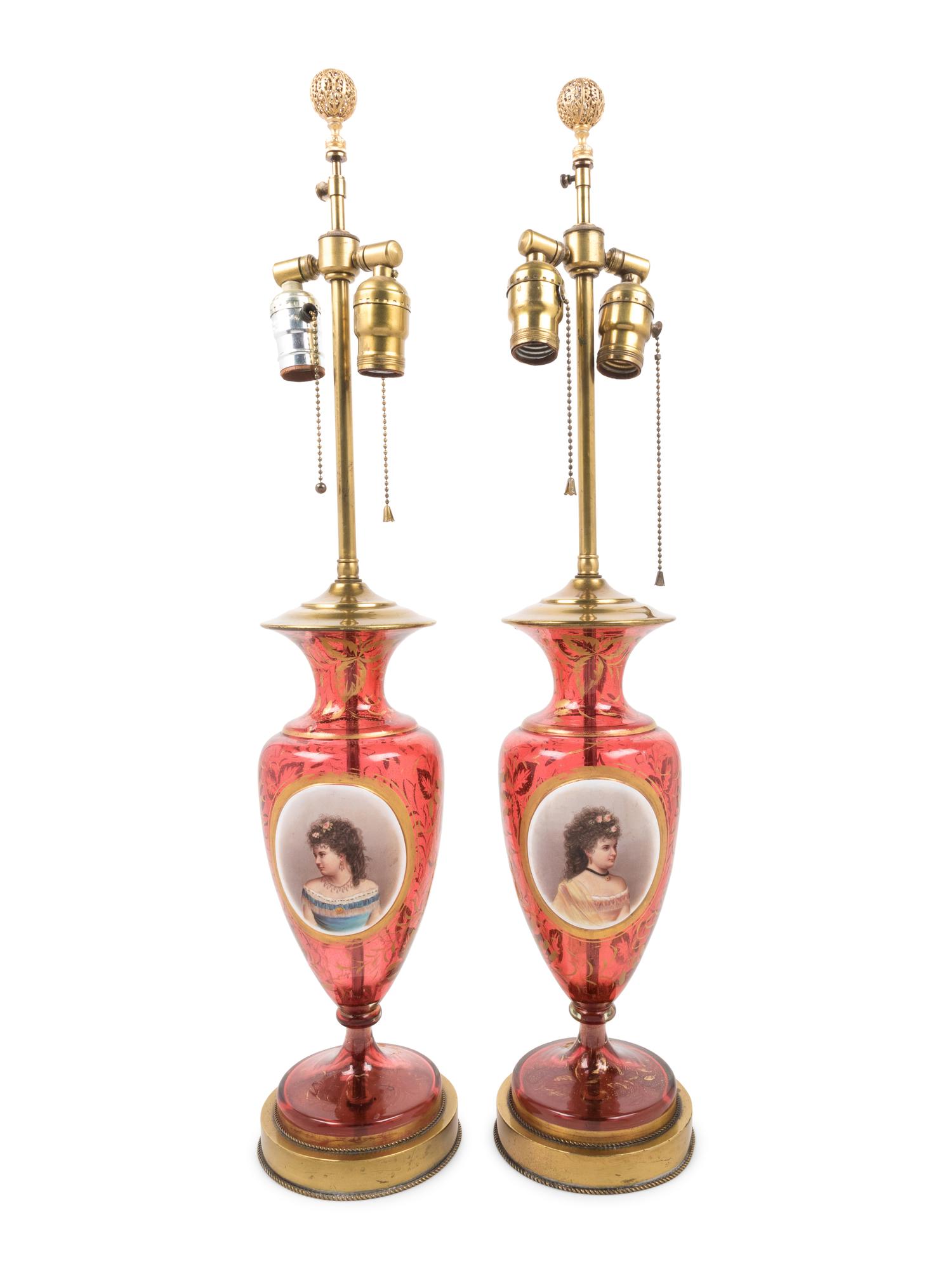 A Pair of French Enameled Cranberry Glass Vases Mounted as Lamps