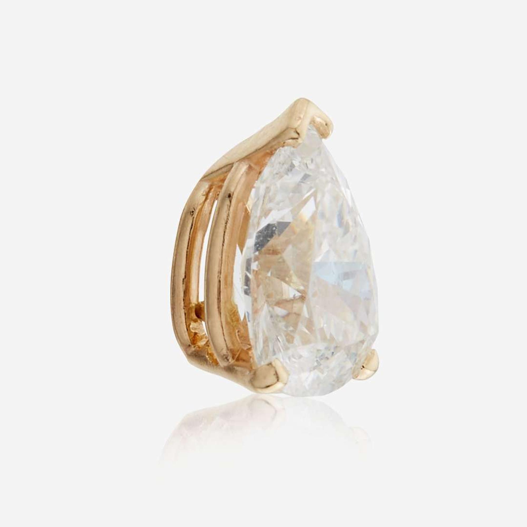 A diamond and gold pendant necklace