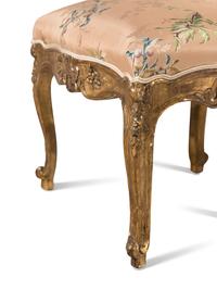 A Set of Ten Régence Style Giltwood Dining Chairs
