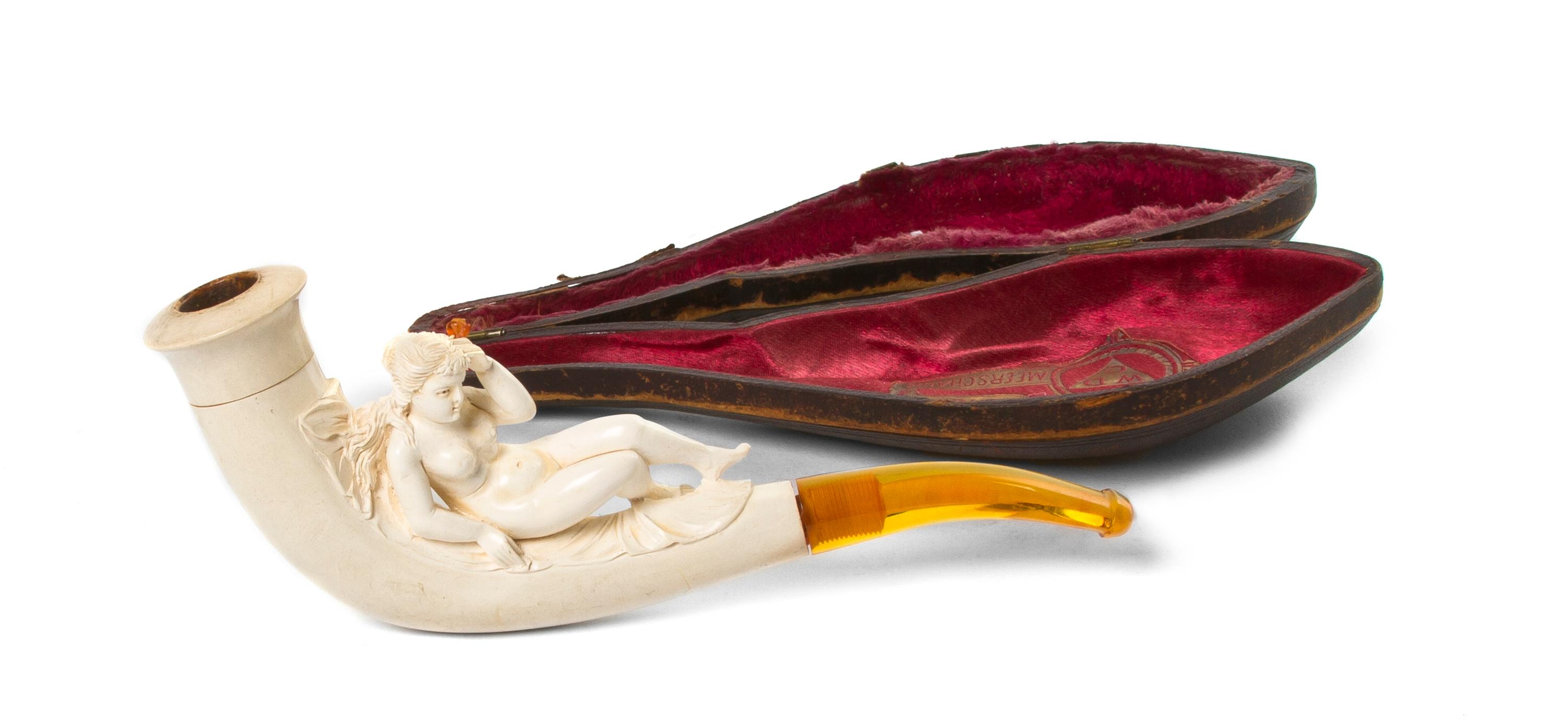 A Carved Meerschaum Pipe, Length overall 6 1/2 inches.