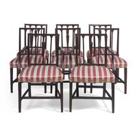 A Set of Eight George III Carved Mahogany Dining Chairs