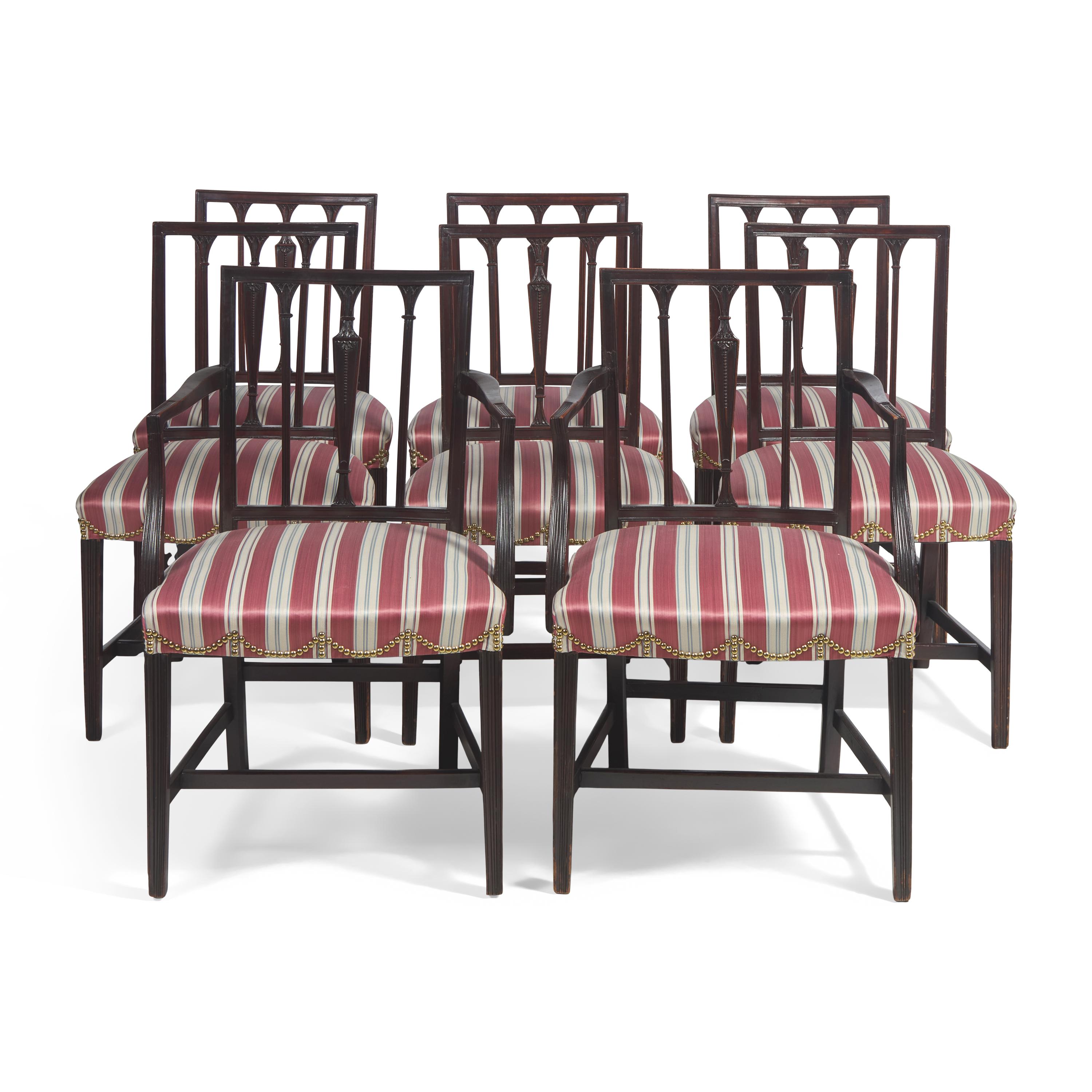 A Set of Eight George III Carved Mahogany Dining Chairs
