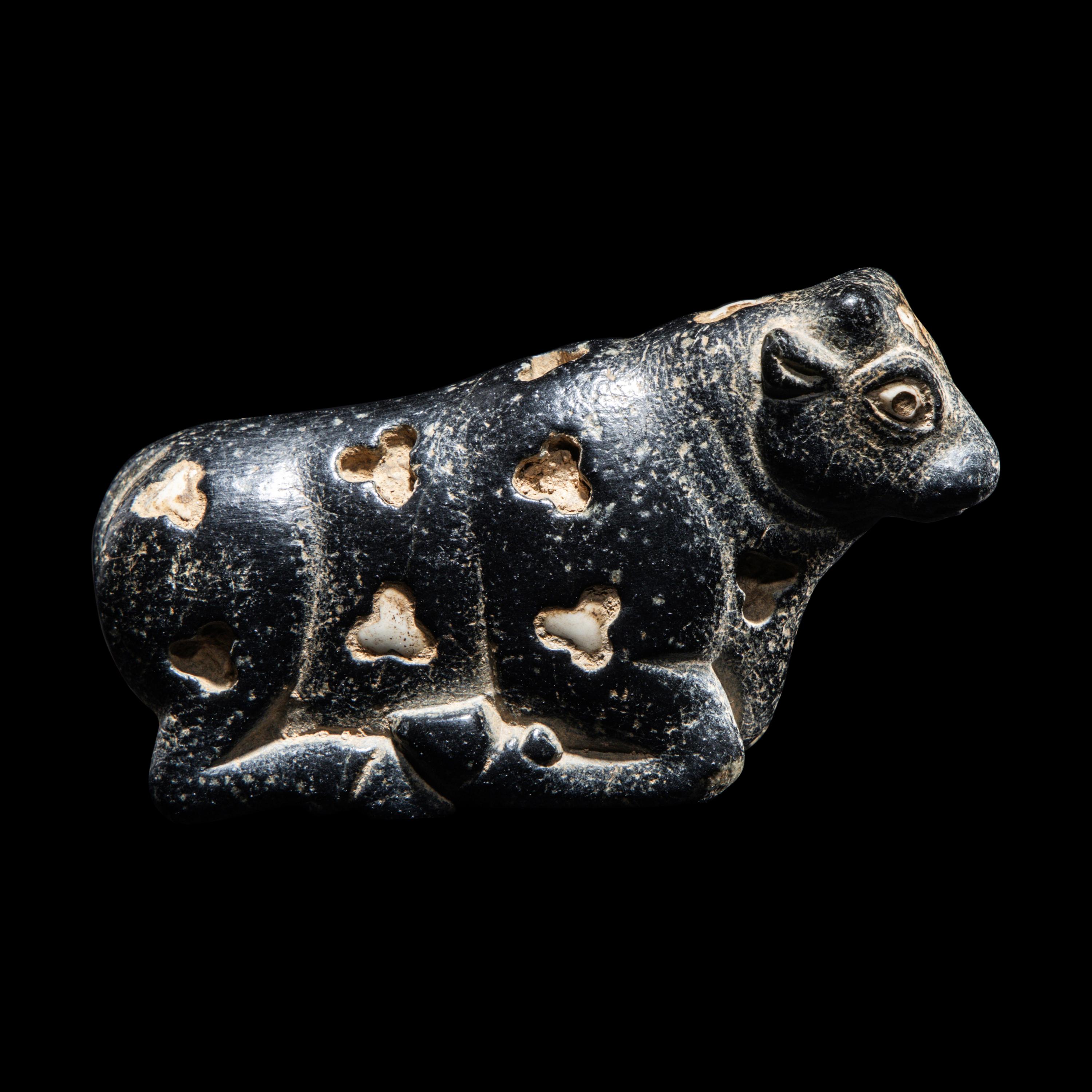 A Mesopotamian Marble and Limestone Inlay Recumbent Calf