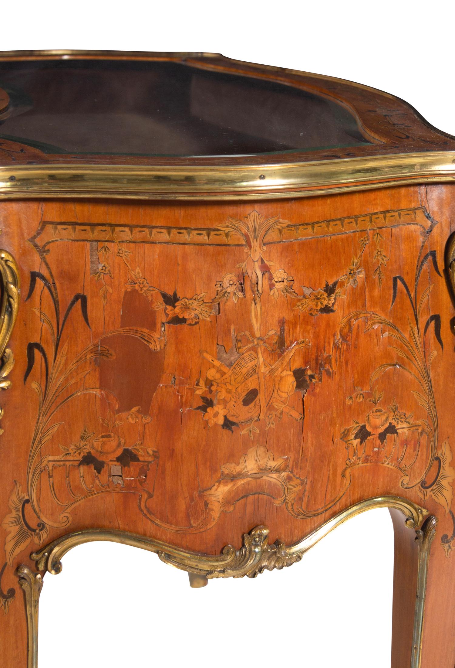 A Louis XV Style Gilt Bronze Mounted Penwork and Marquetry Vitrine Commode