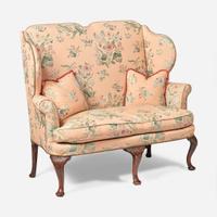 A George I carved walnut settee early 18th century
