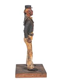 A Carved Wood and Papier-Mache Figure of a Sailor