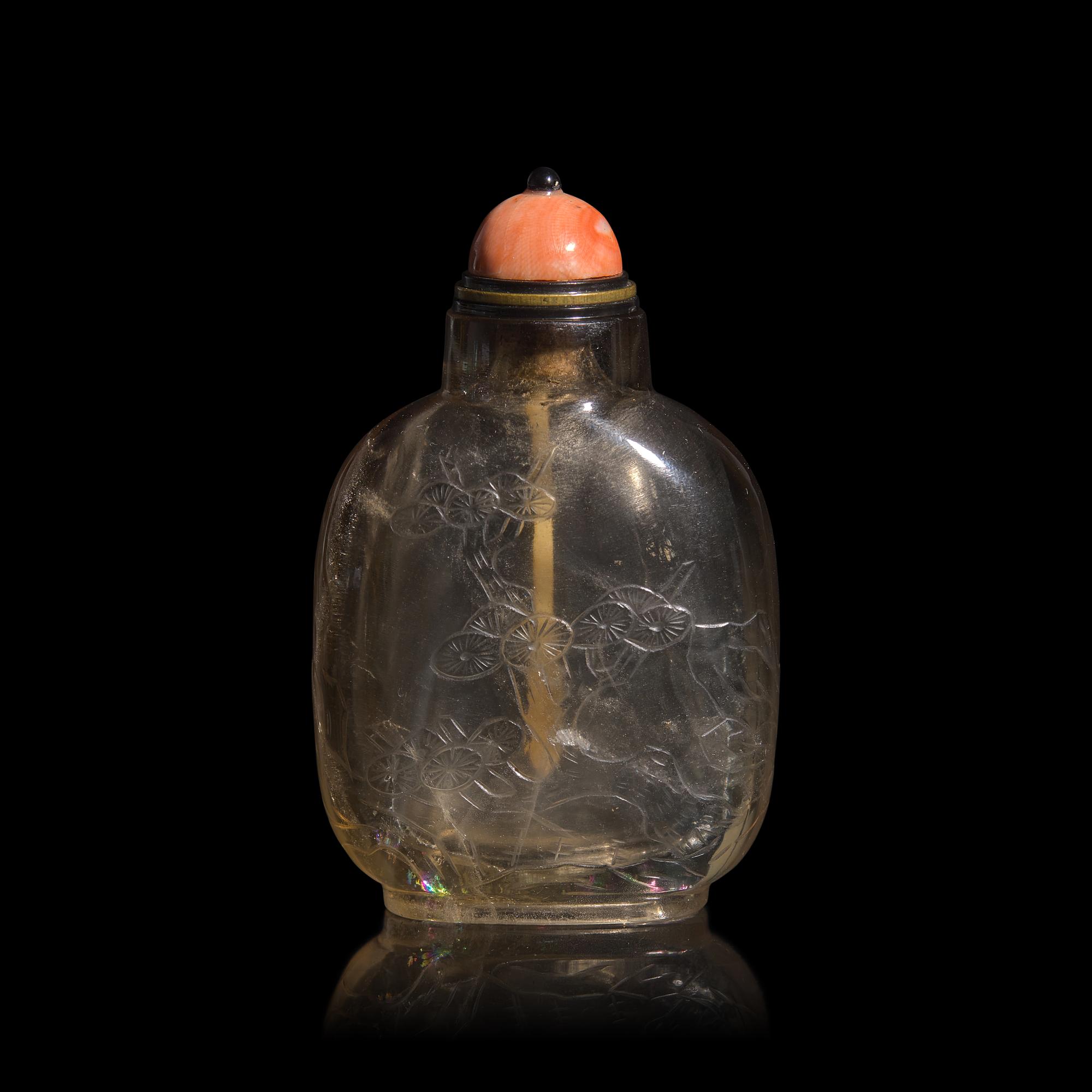 A Chinese Carved Smokey Quartz Snuff Bottle