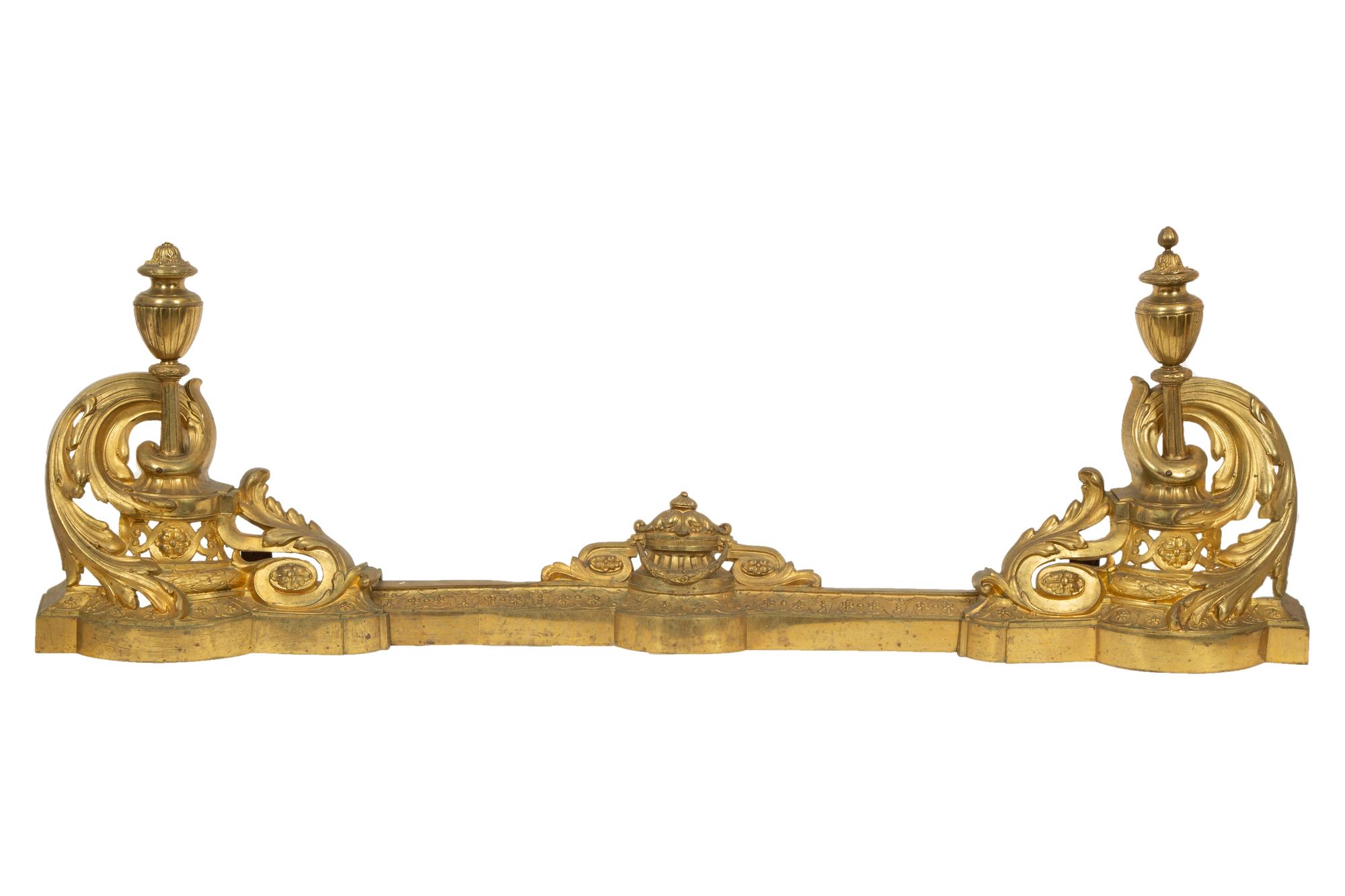 A Pair of Louis XV Style Gilt Bronze Chenets and Fender