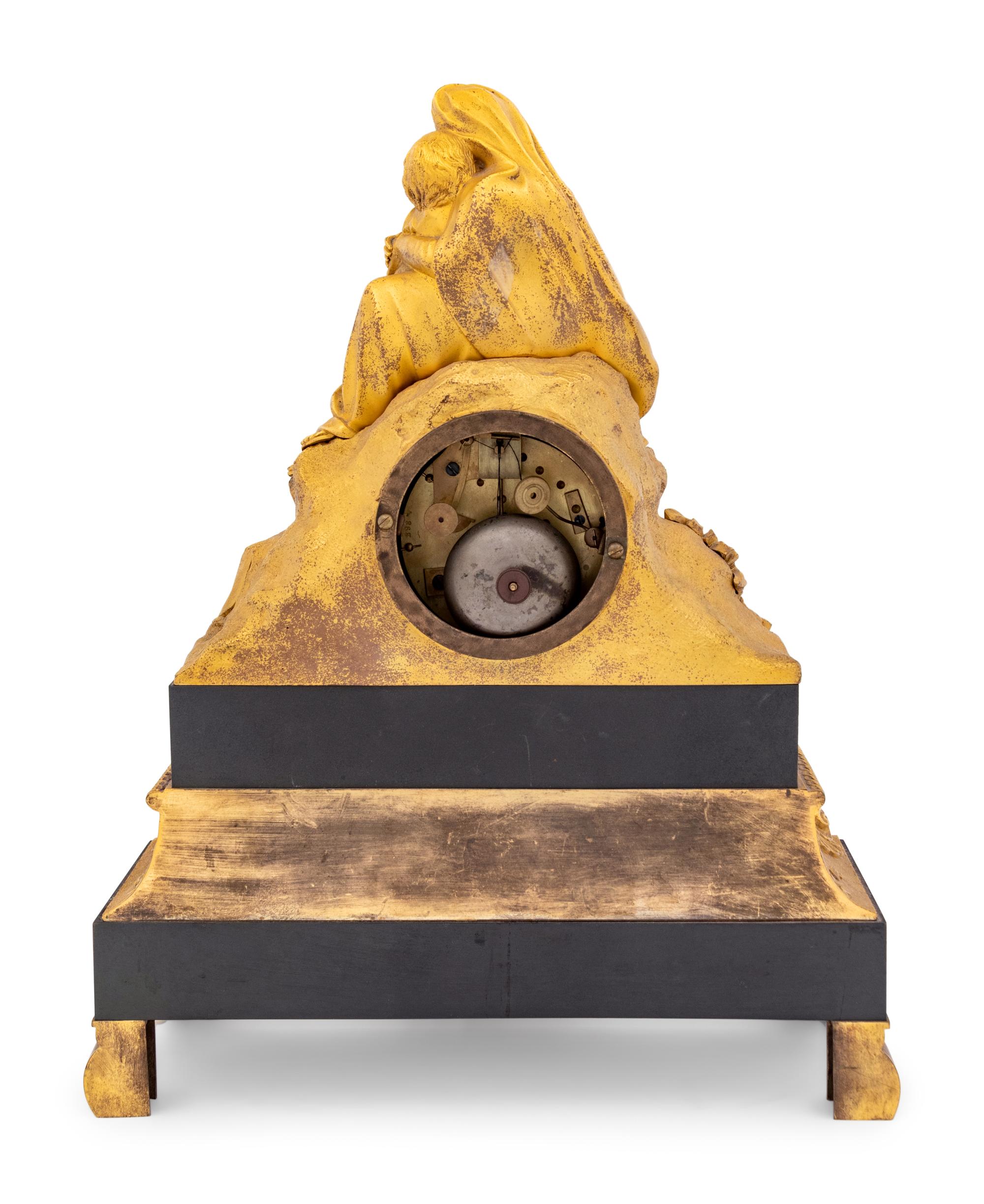 A Napoleon III Style Gilt Metal Figural Mantel Clock