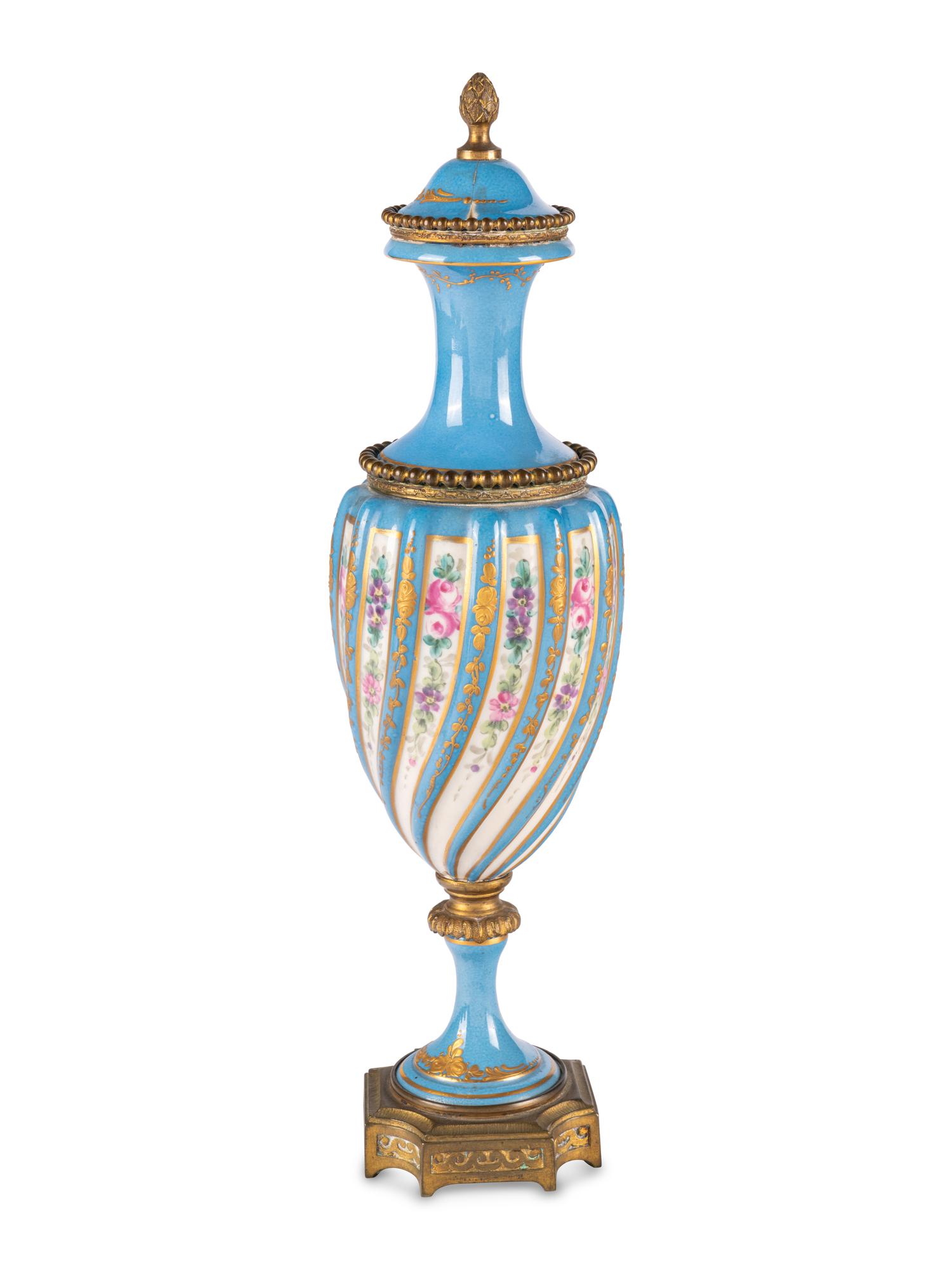 A Sevres Style Gilt Metal Mounted Porcelain Covered Urn