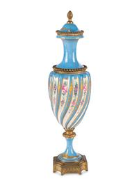 A Sevres Style Gilt Metal Mounted Porcelain Covered Urn