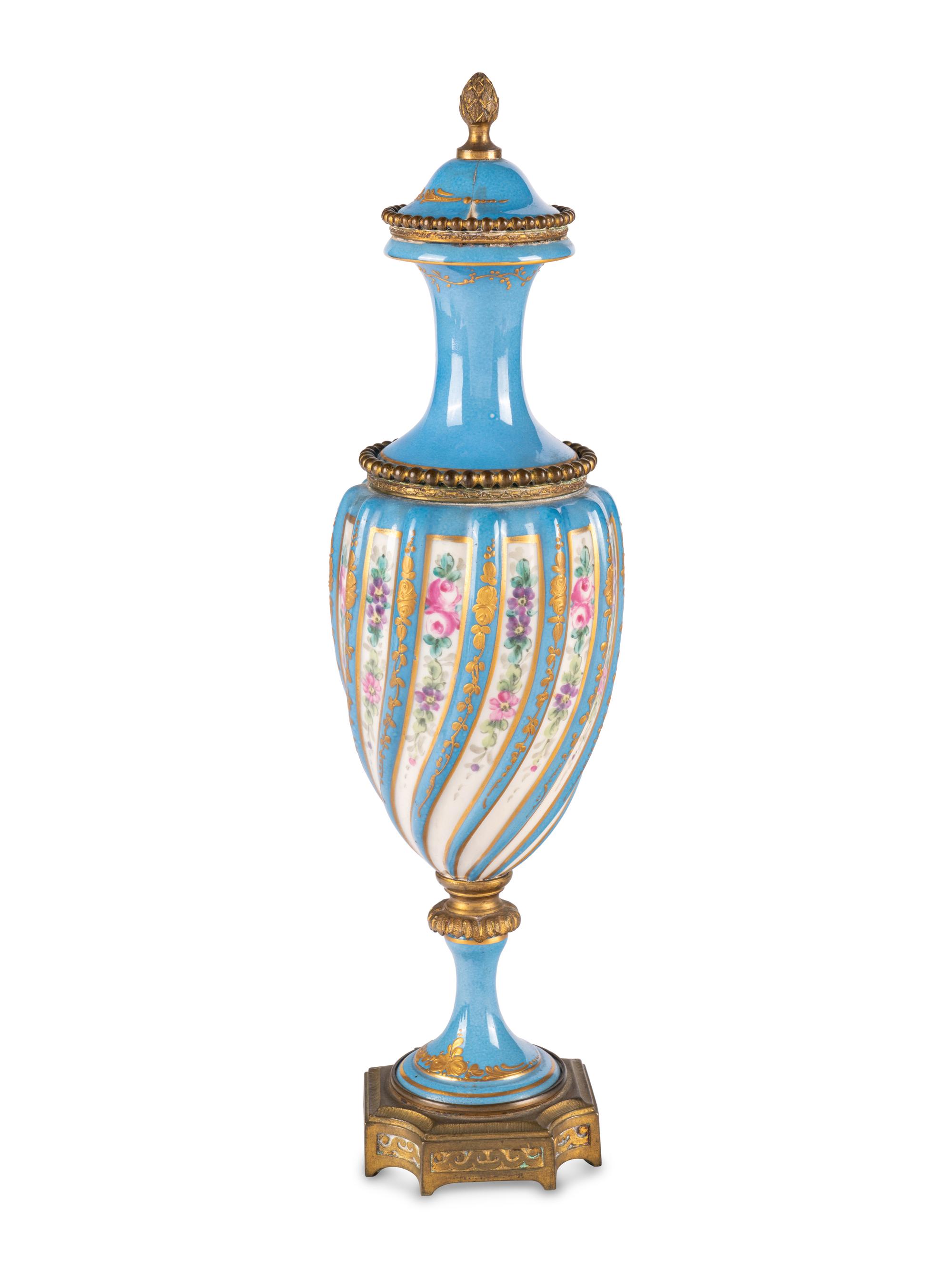 A Sevres Style Gilt Metal Mounted Porcelain Covered Urn