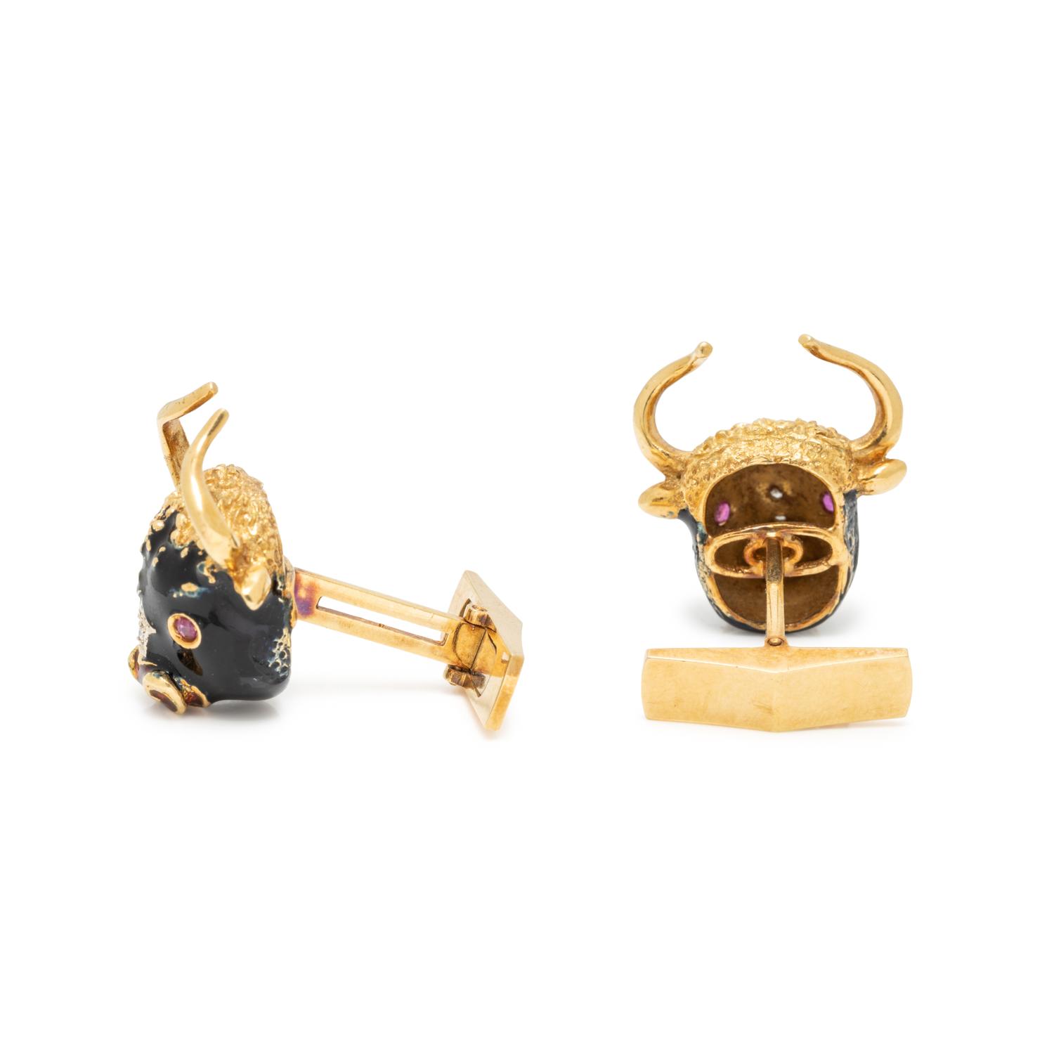 YELLOW GOLD, ENAMEL, DIAMOND, AND RUBY TAURUS CUFFLINKS