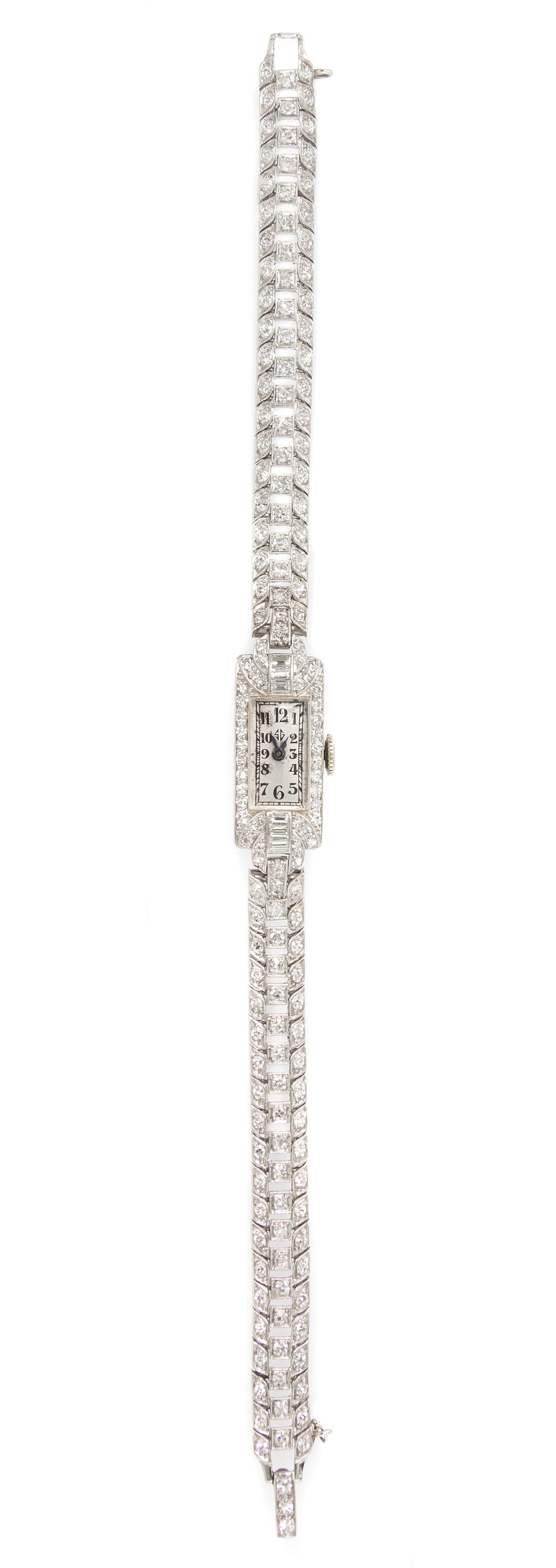A Platinum and Diamond Wristwatch, Longines for Spaulding Gorham, 19.30 dwts.