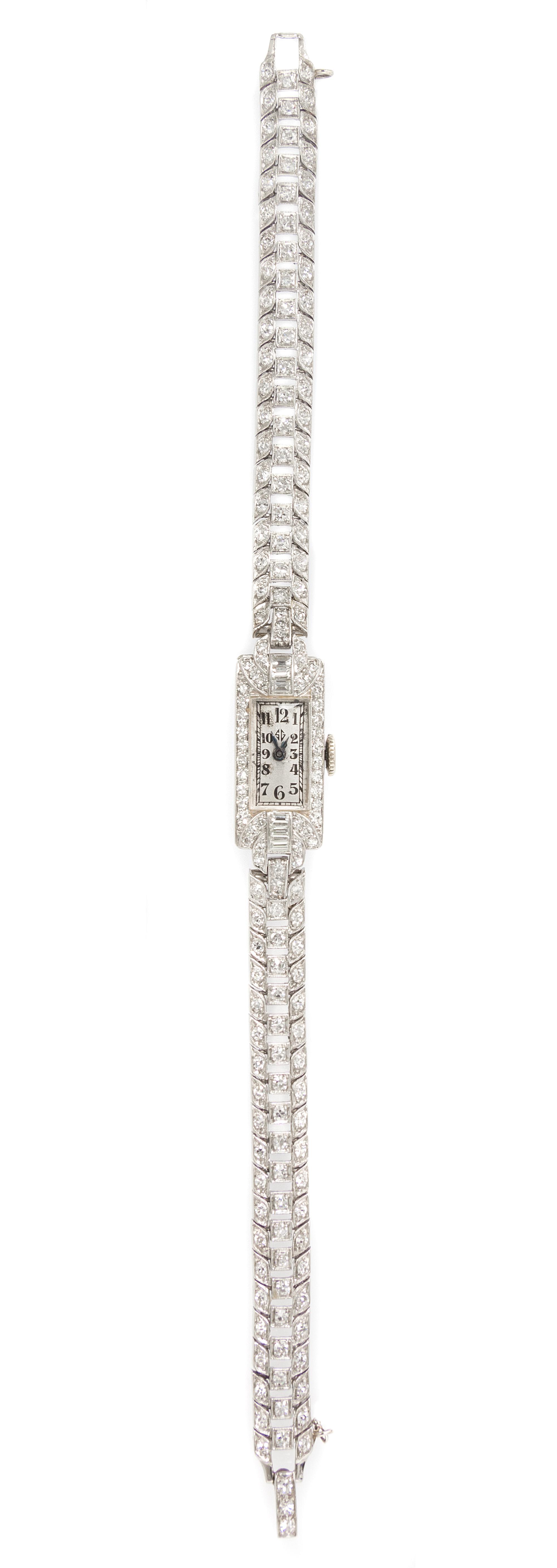 A Platinum and Diamond Wristwatch, Longines for Spaulding Gorham, 19.30 dwts.