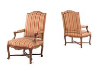 A Pair of Régence Carved Walnut Armchairs