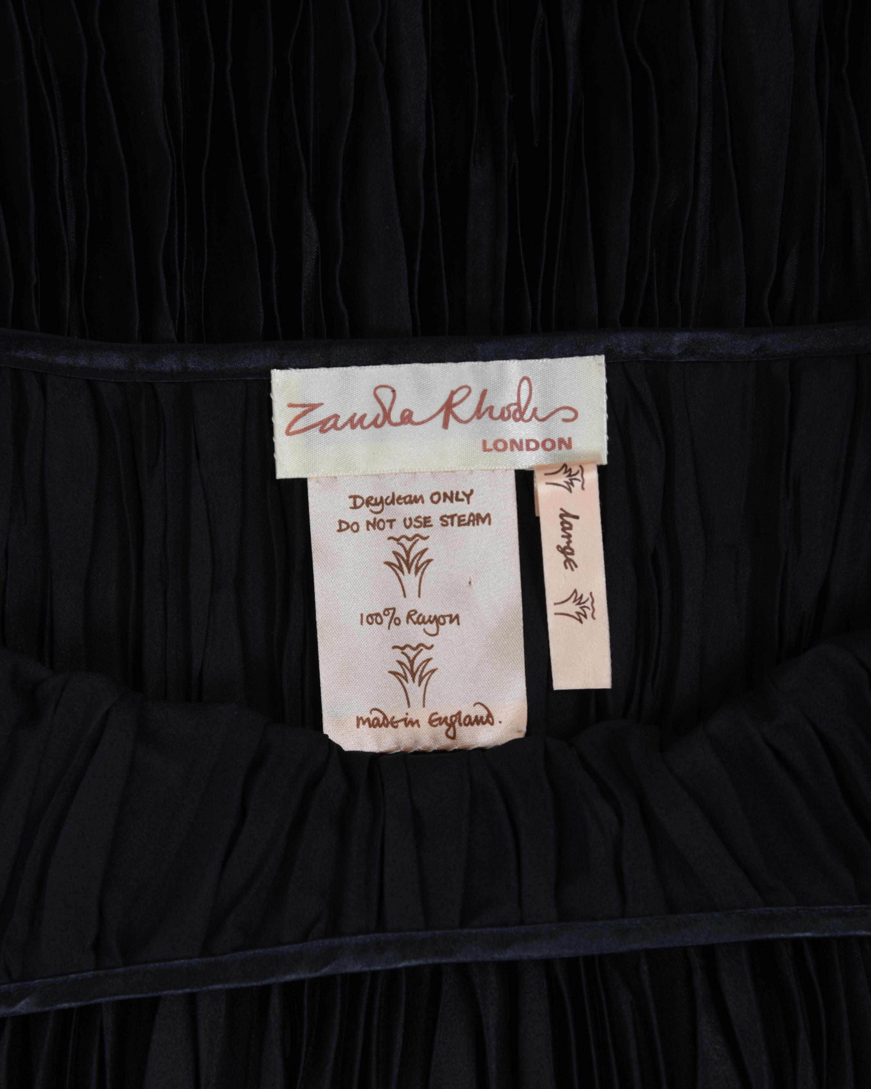 Three Pleated Items: One Zandra Rhodes Bolero and Dress, and One Mary McFadden Dress with Belt, 1980s