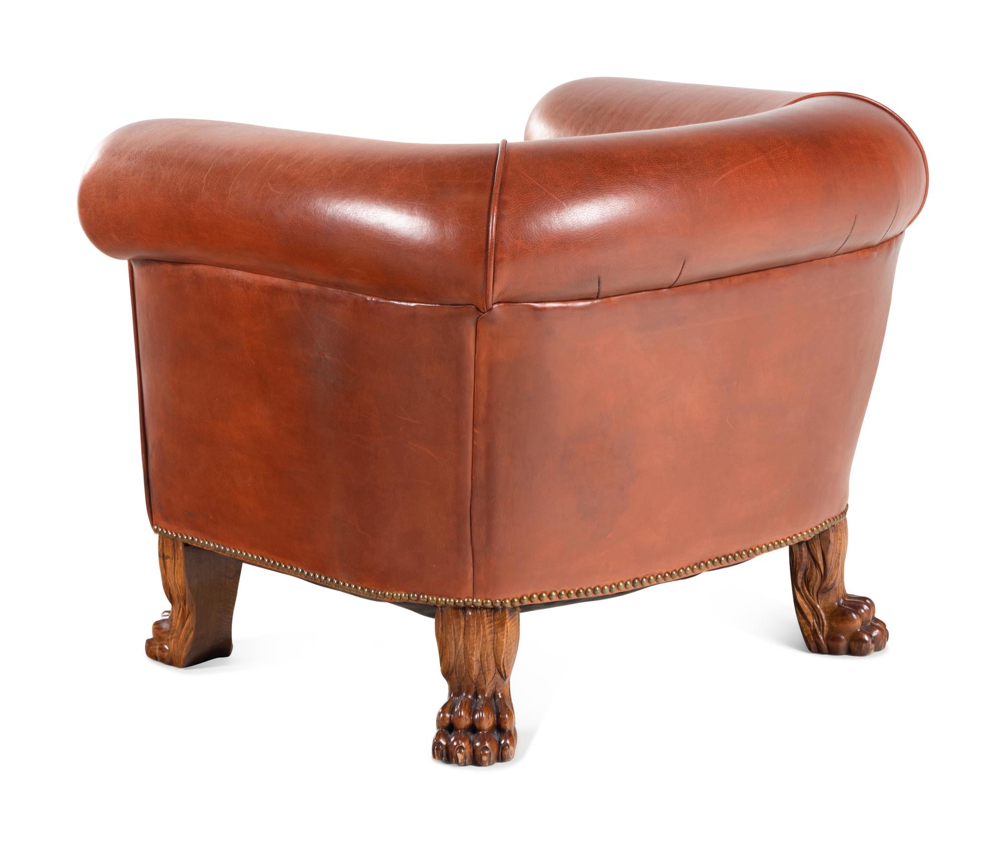 A Leather-Upholstered Mahogany Three-Piece Seating Suite