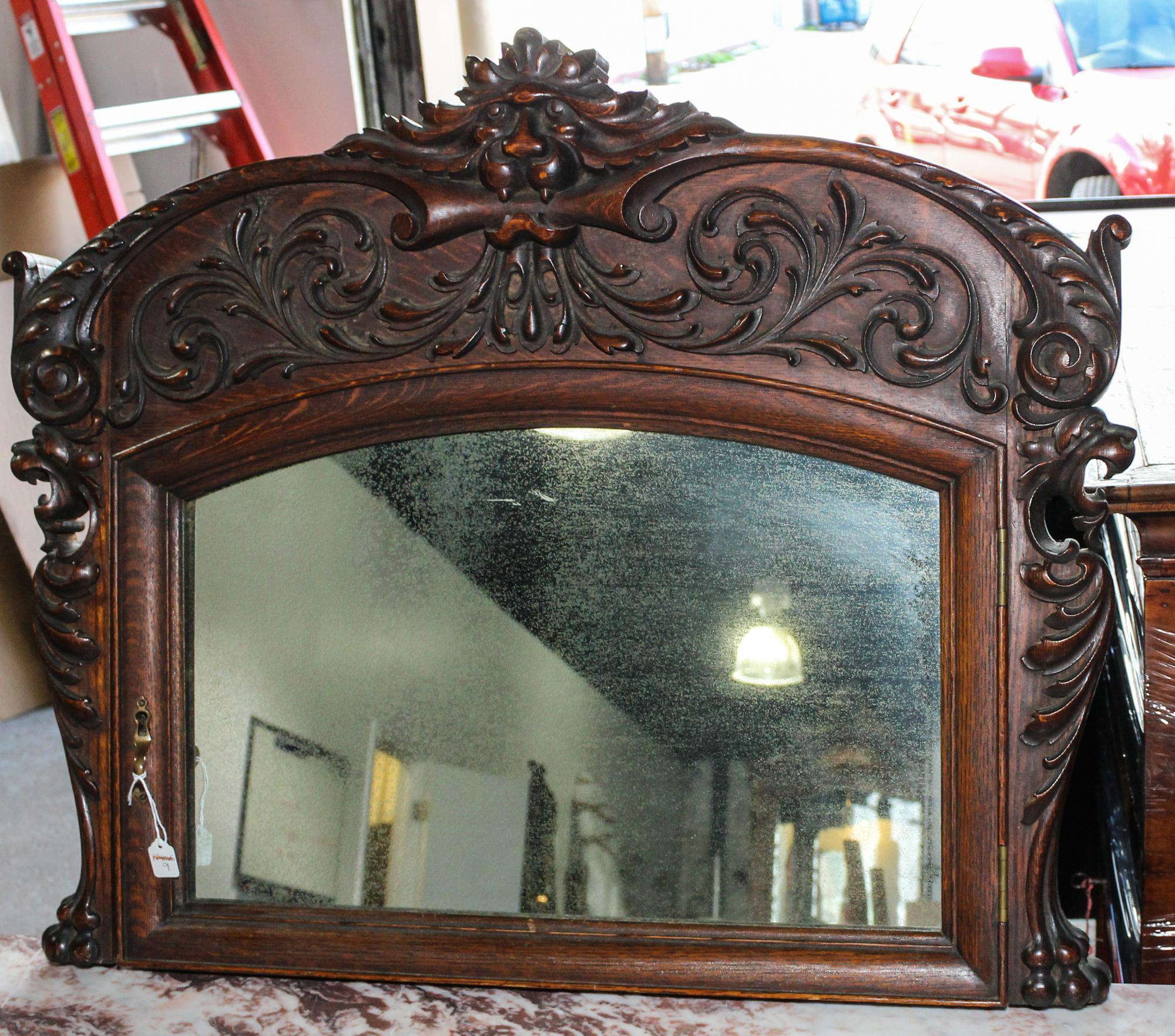 A Renaissance Revival Carved Oak Mirror Height 23 x width 29 inches. — 19TH/20TH CENTURY