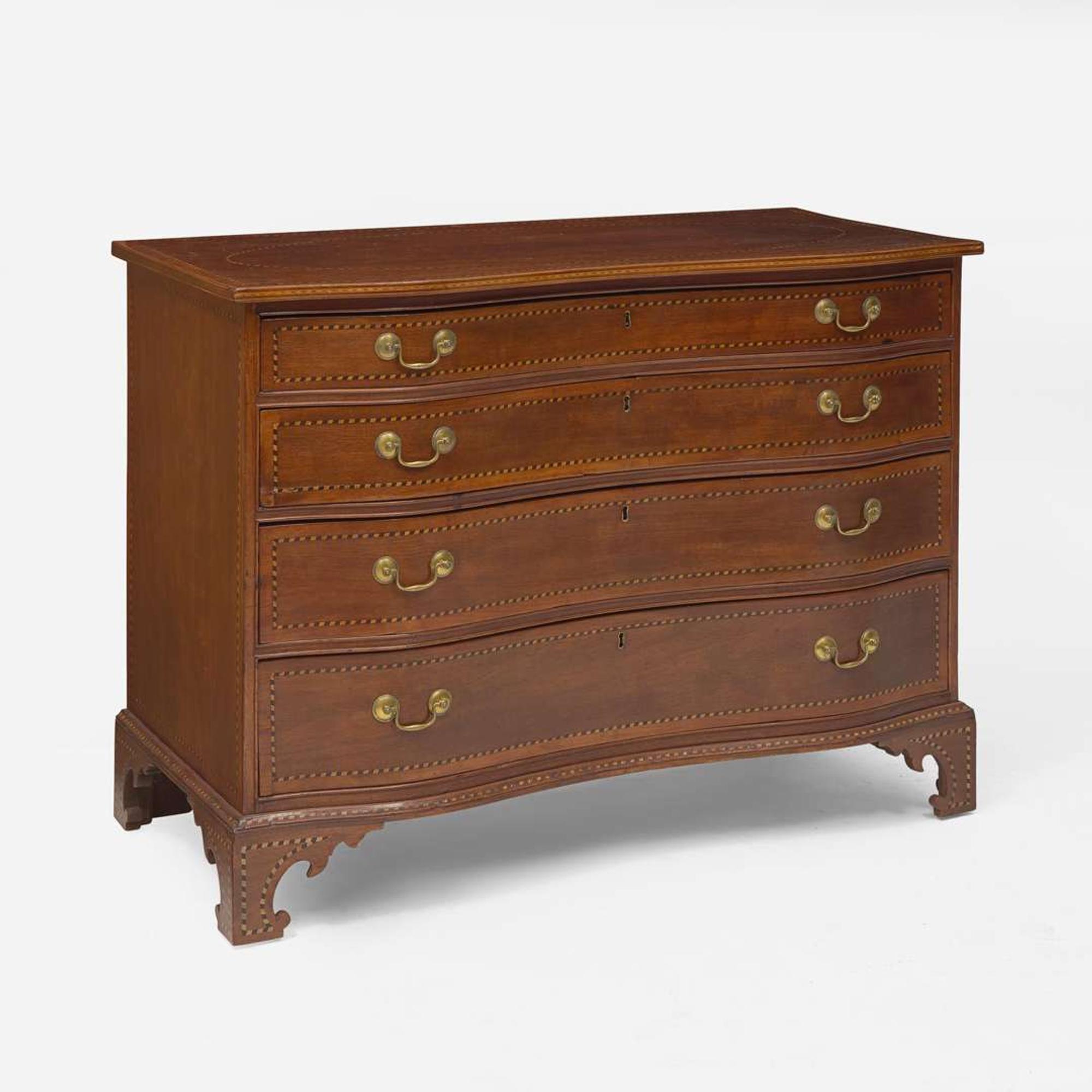 A Federal reverse serpentine inlaid cherry chest of drawers New England, circa 1810