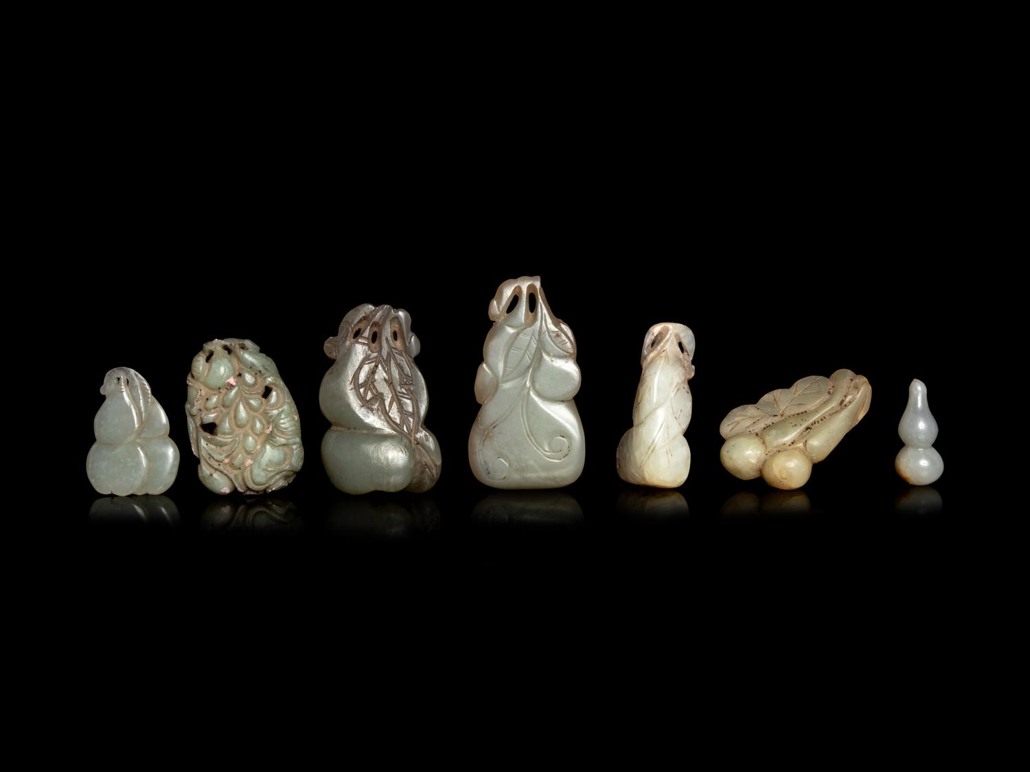 Seven Chinese Celadon Jade Carvings of Double Gourds