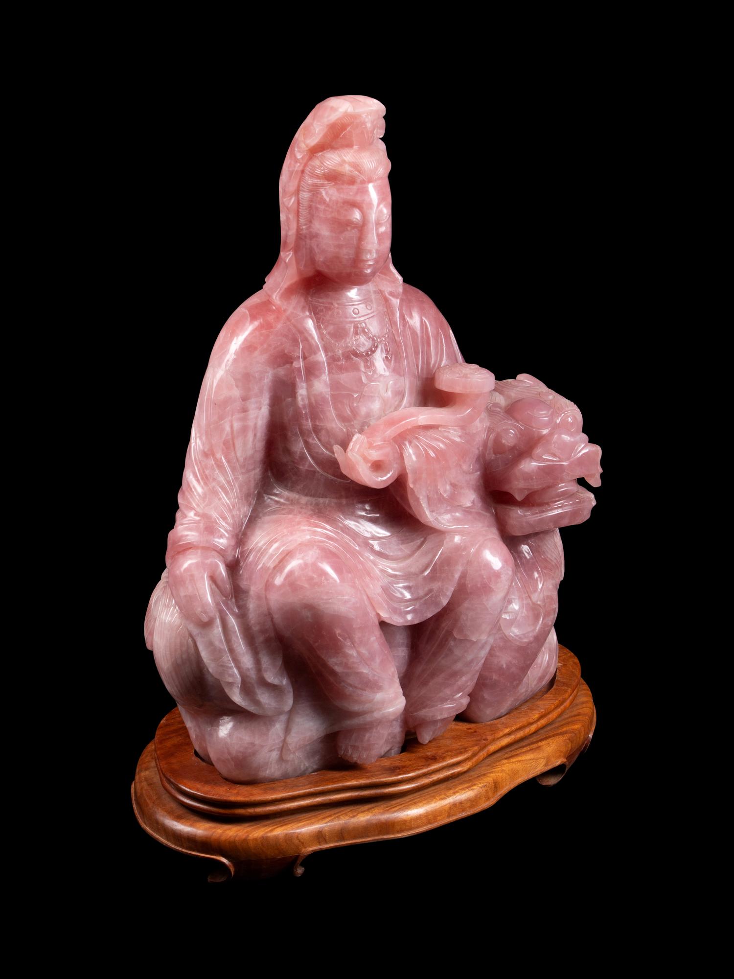 A Chinese Carved Rose Quartz Figure of Guanyin