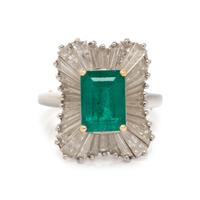 PLATINUM, EMERALD, AND DIAMOND BALLERINA RING