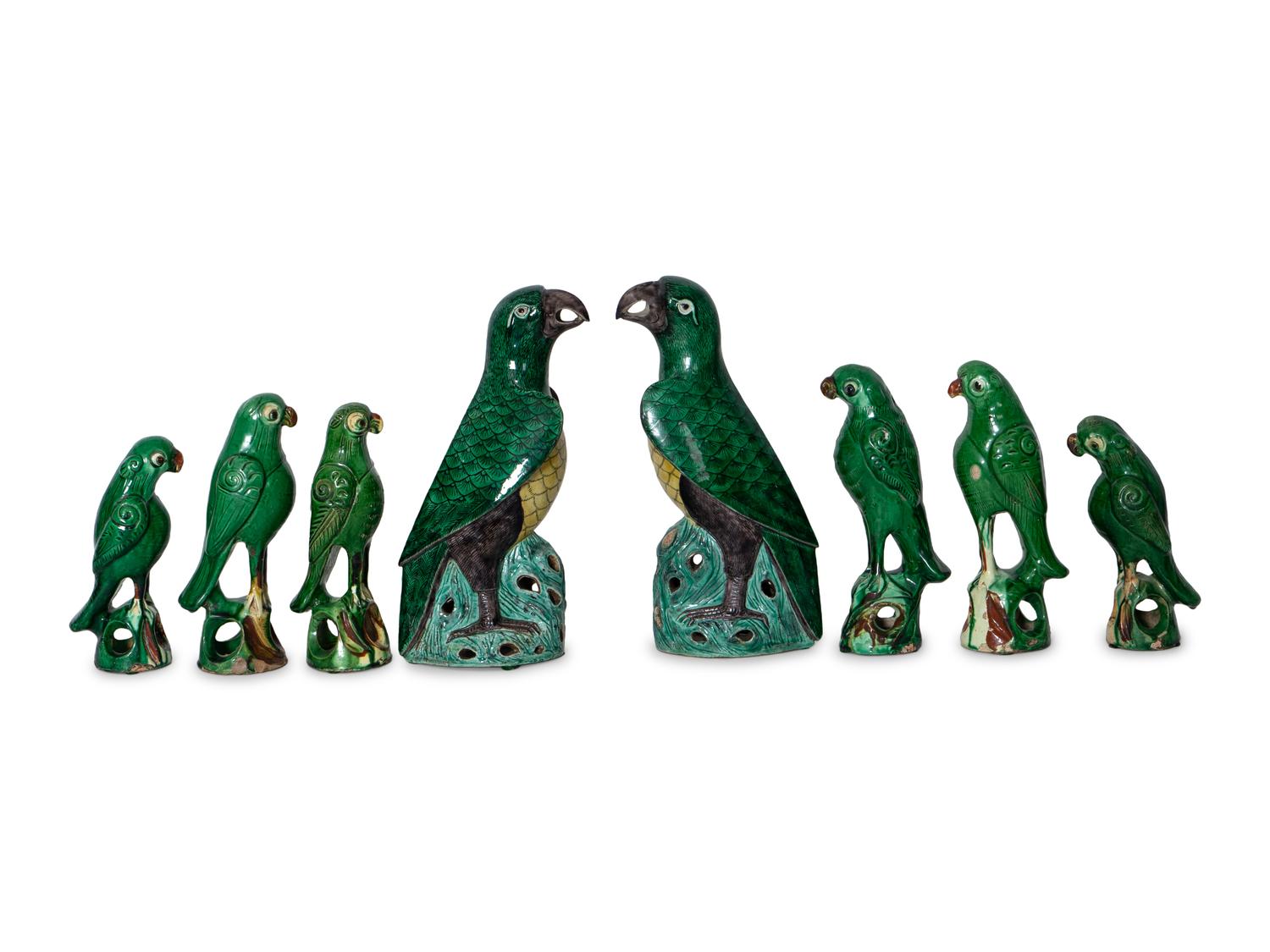 A Group of Eight Chinese Export Ceramic Parrots