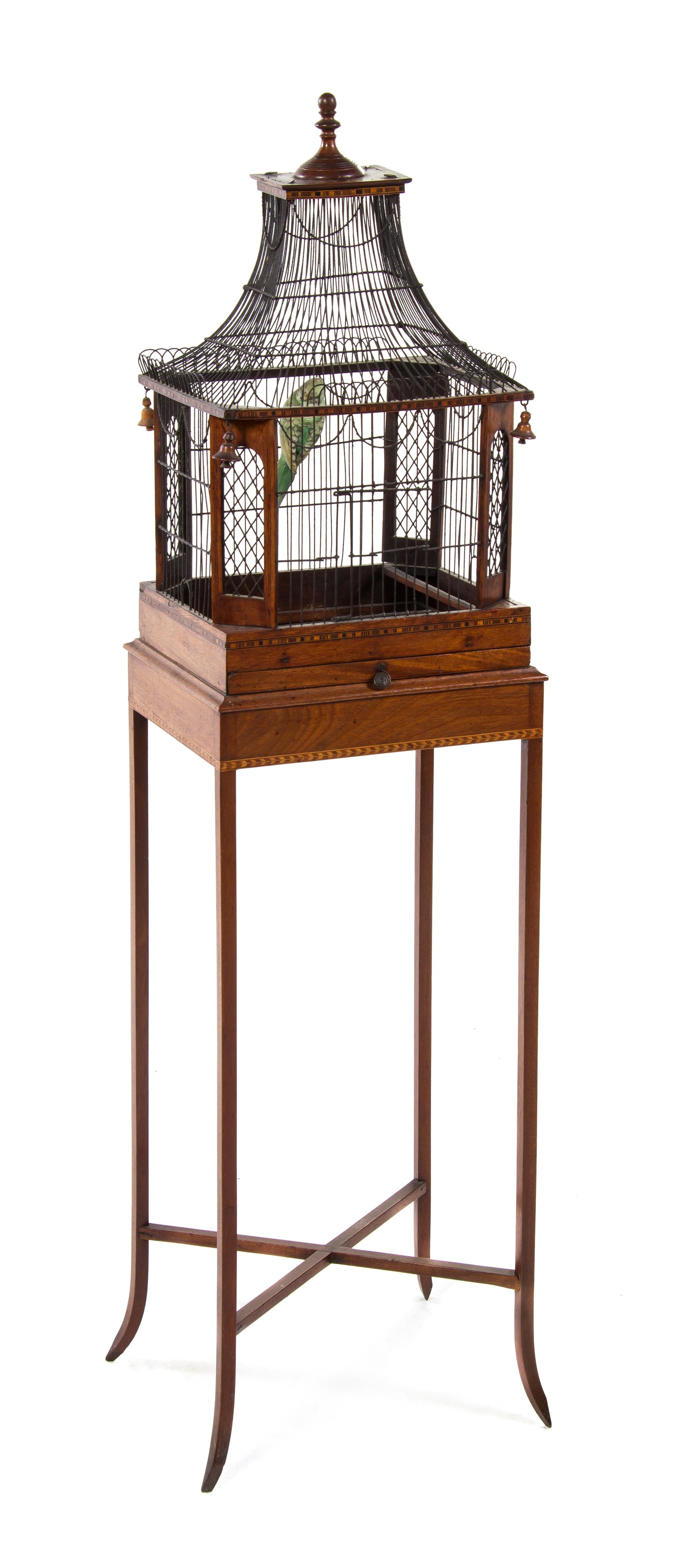 A Victorian Mahogany and Wirework Birdcage, Height overall 51 inches.